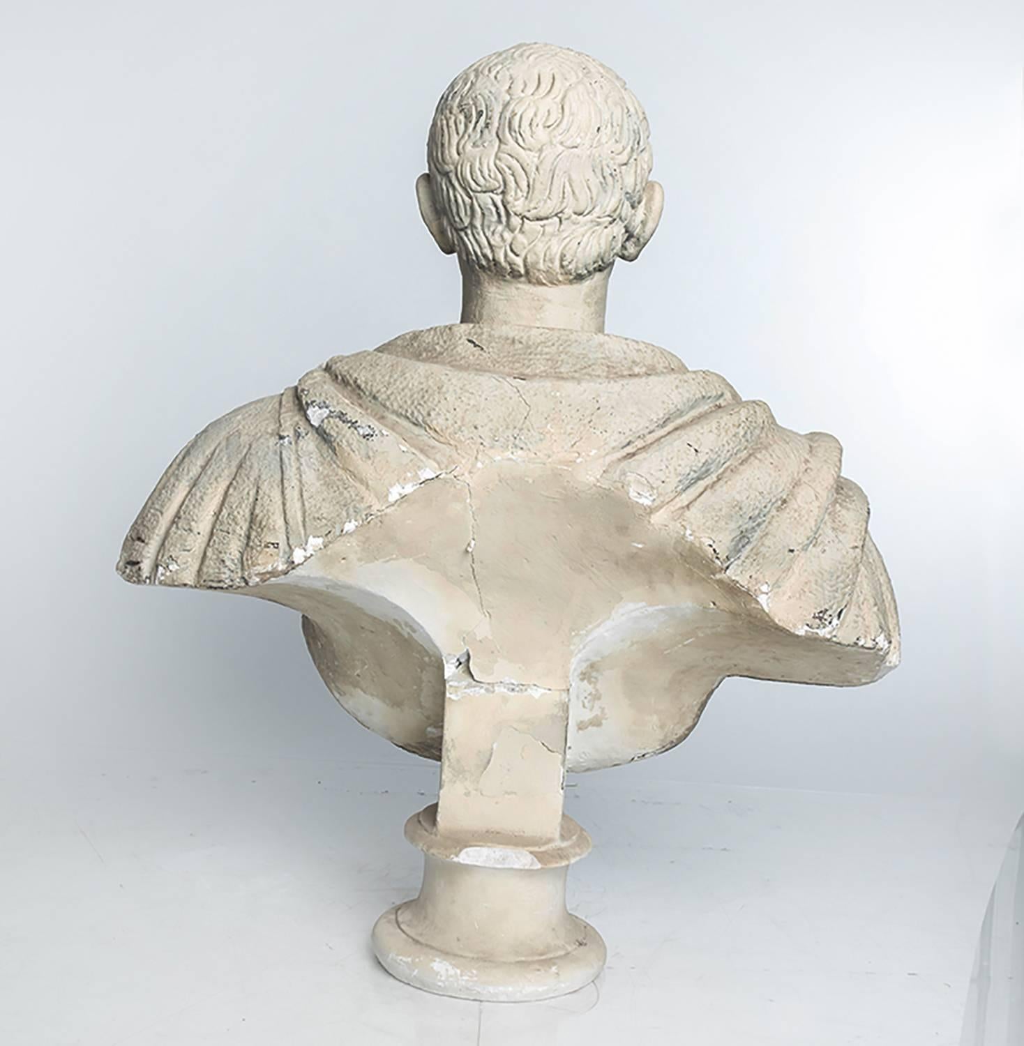 Plaster portrait bust of what appears to be a neoclassical military leader. Believed to have been used for theatrical display.