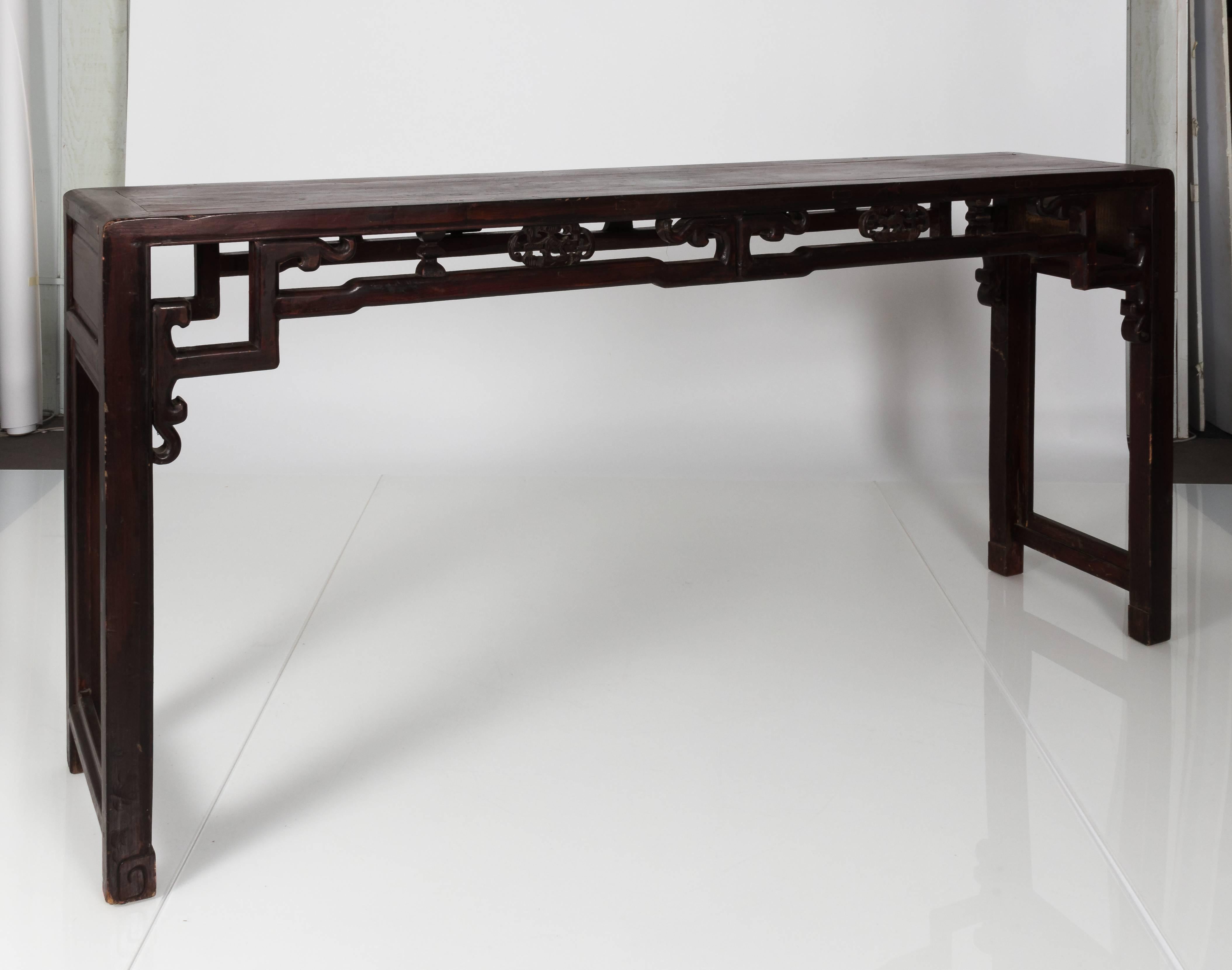 Mahogany Chinese alter table with carved and pierced skirt.
