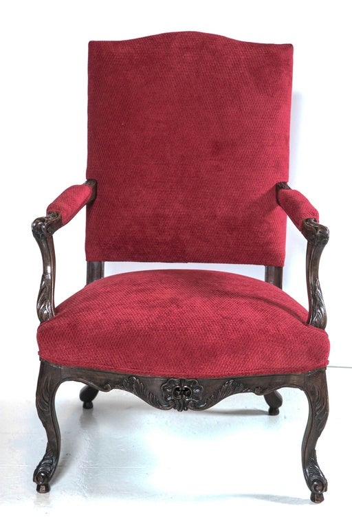 Lovely French carved wood walnut open arm chair in new red fabric superb condition, & very sturdy.#034-04