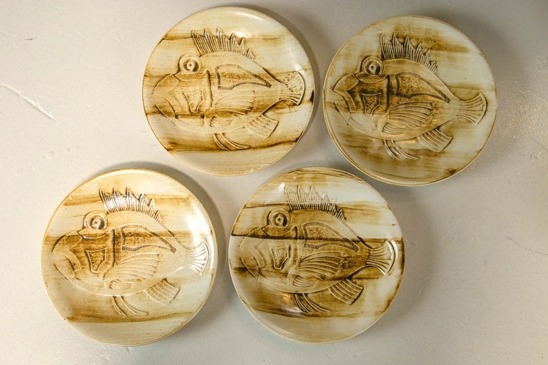 Set of 11 Mid-Century longchamp fish plates.