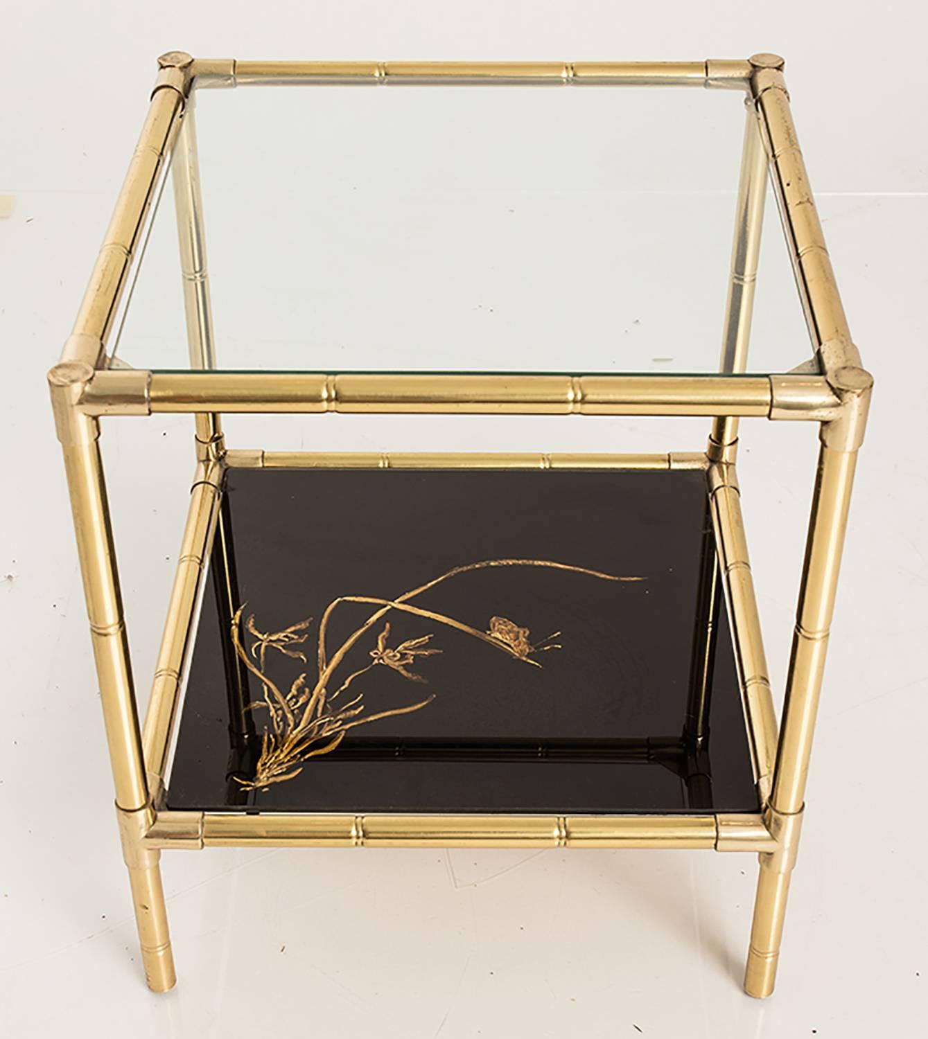 Pair of brass and reverse painted glass side tables with Chinoserie details and a faux bamboo motif.