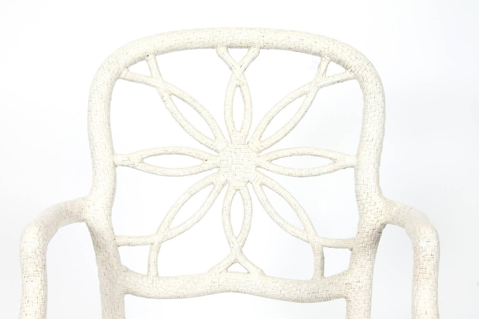 White custom-made wicker chair, sunburst canning.