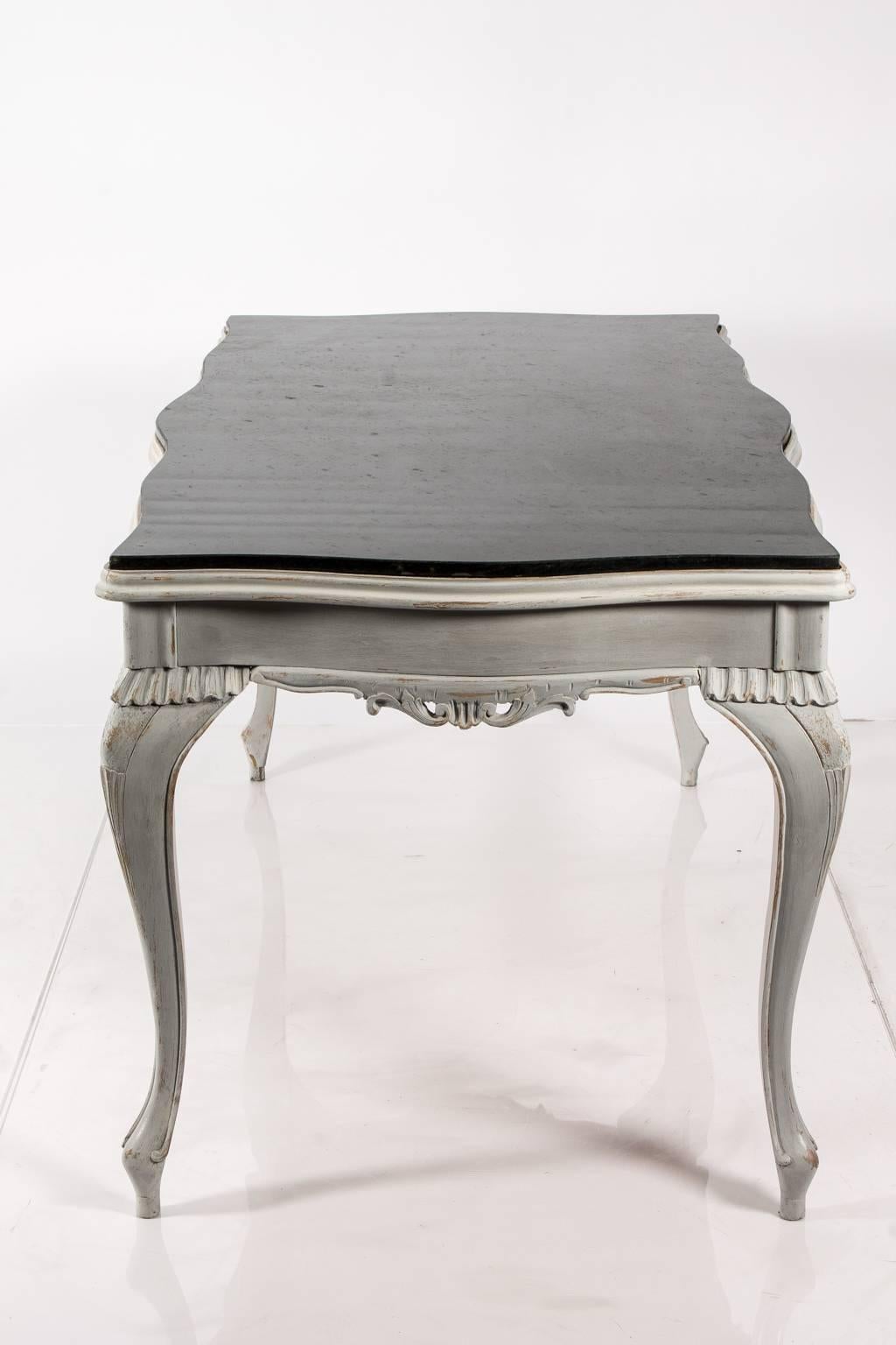 Painted table with cabriole legs and a marble top. Note, this marble is not original to the table. The dealer found the marble piece so as you can see in the images, it does not sit flush.