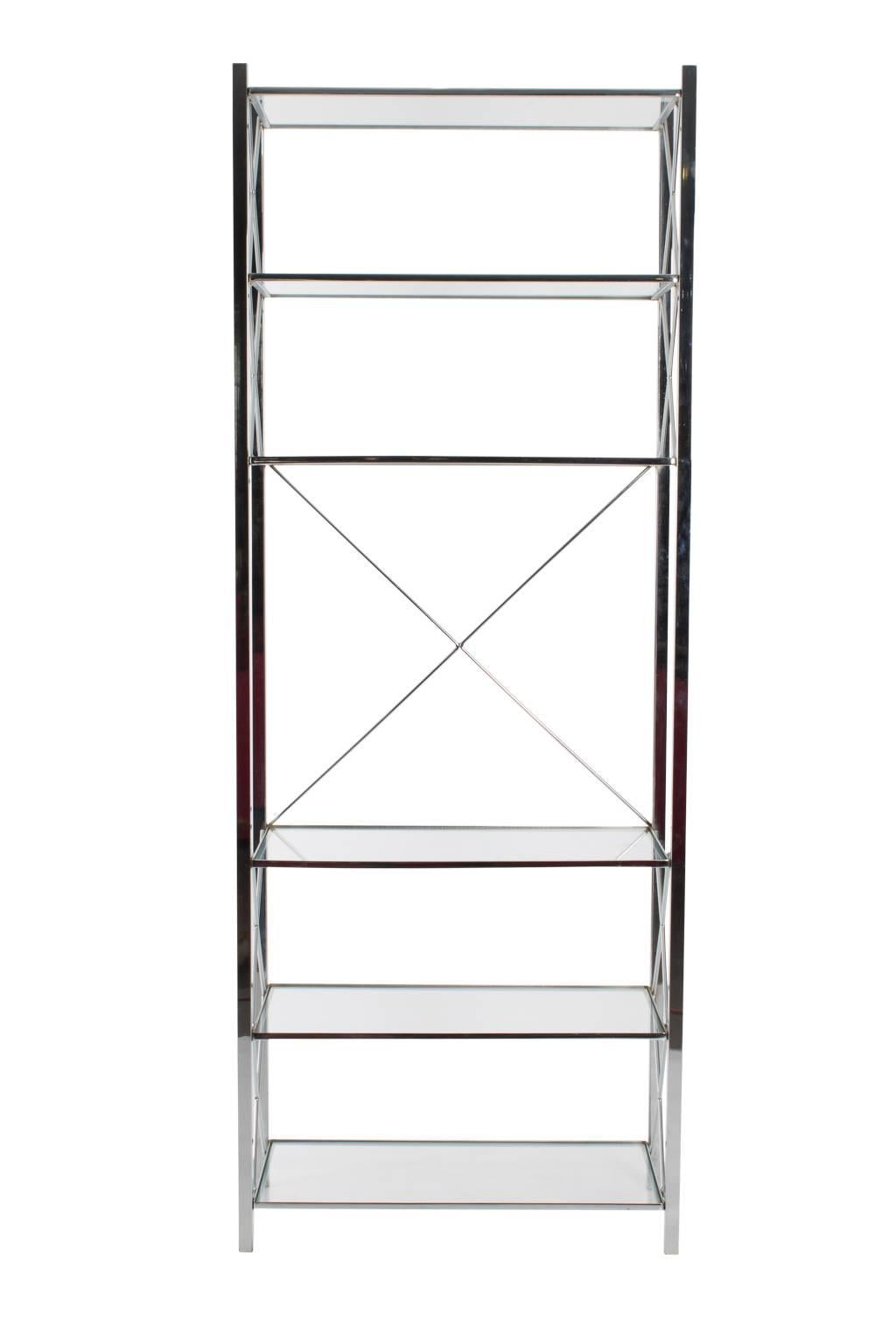 Chrome and glass étagère in the style of John Vesey. Two available, sold individually.
