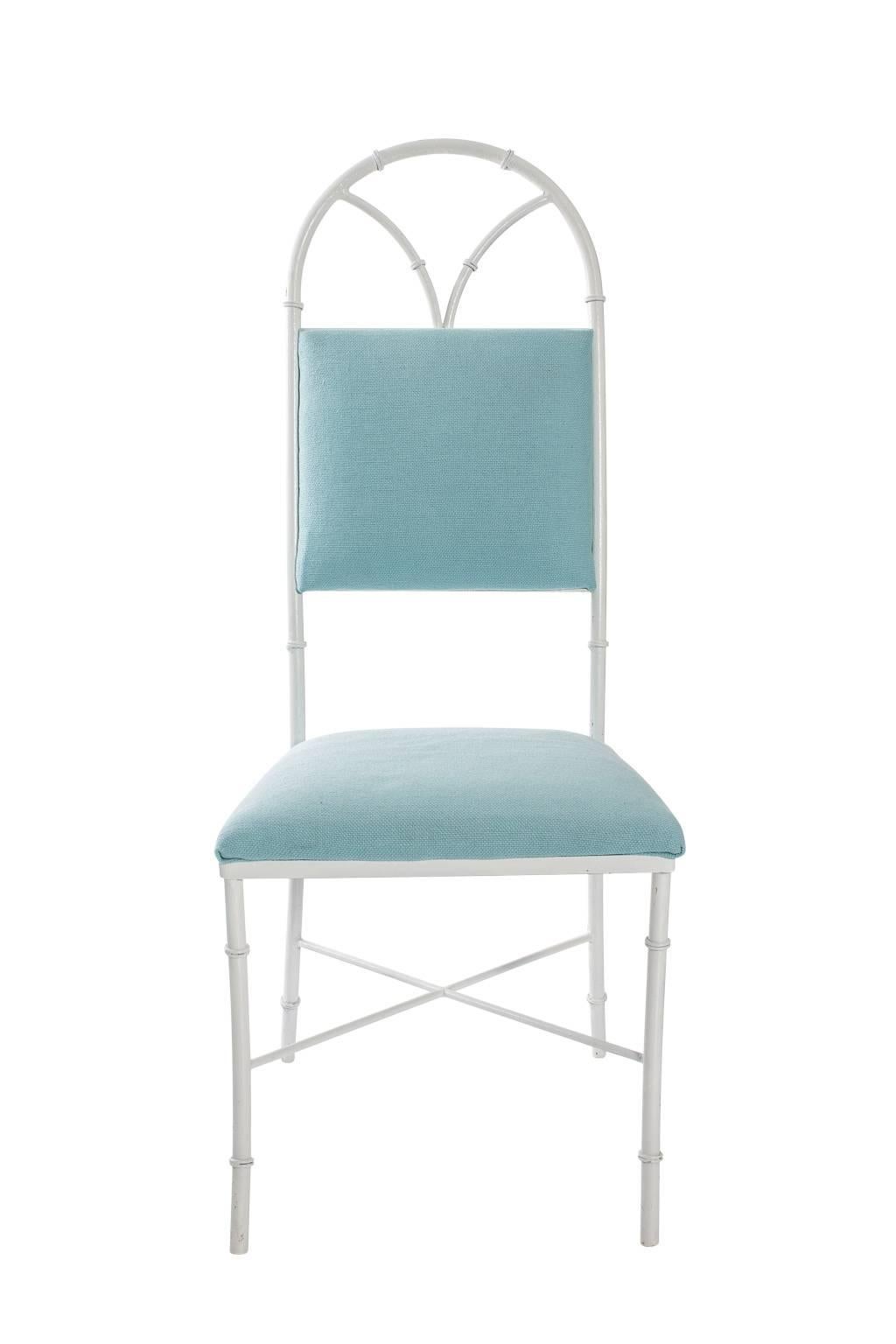 Pair of French, white-painted iron, faux bamboo chairs. Upholstered in pale blue.