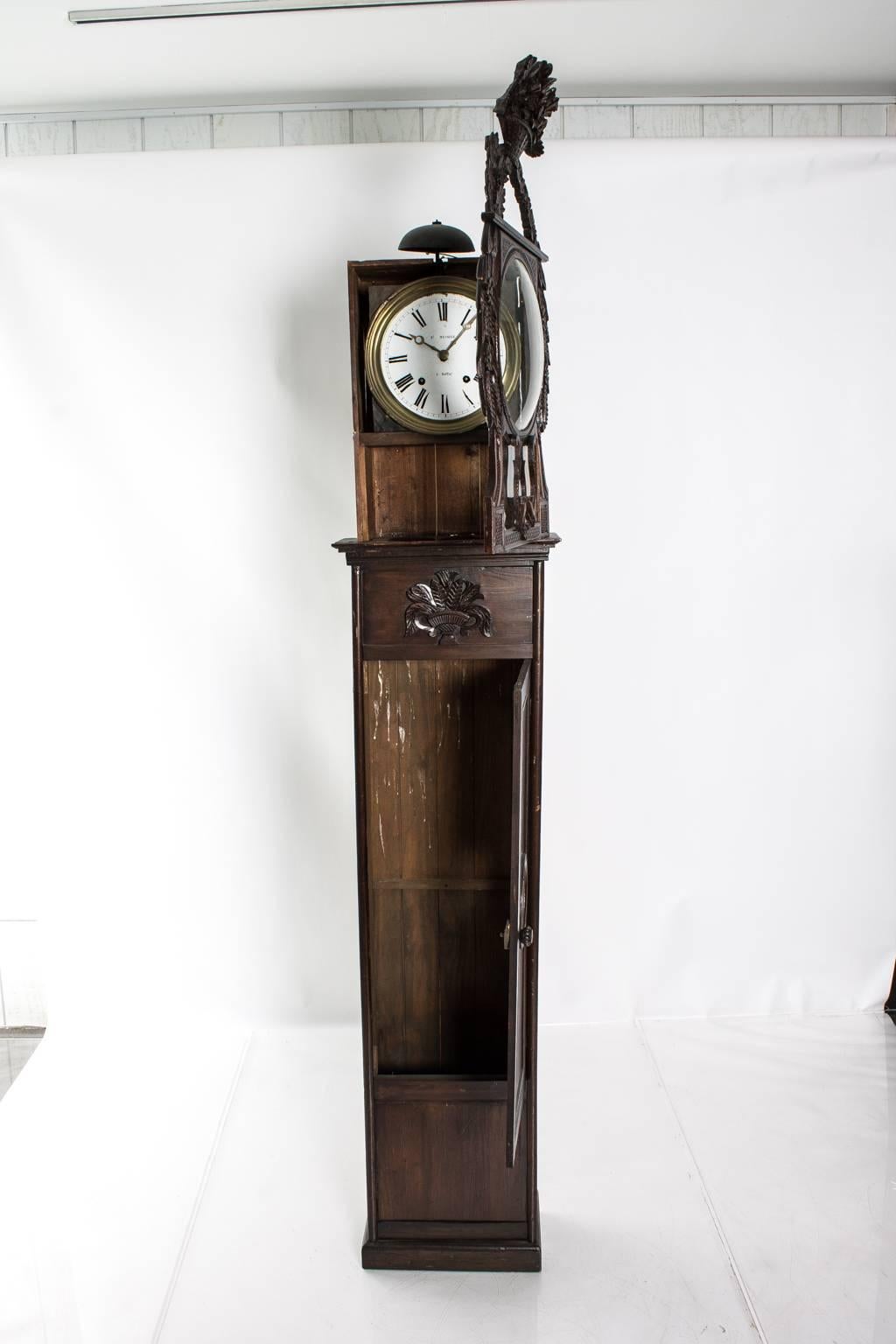 19th century French pine grandfather clock with carved flowers, wheat and basket of fruit. Clock face signed: Auffay, Mesaize.