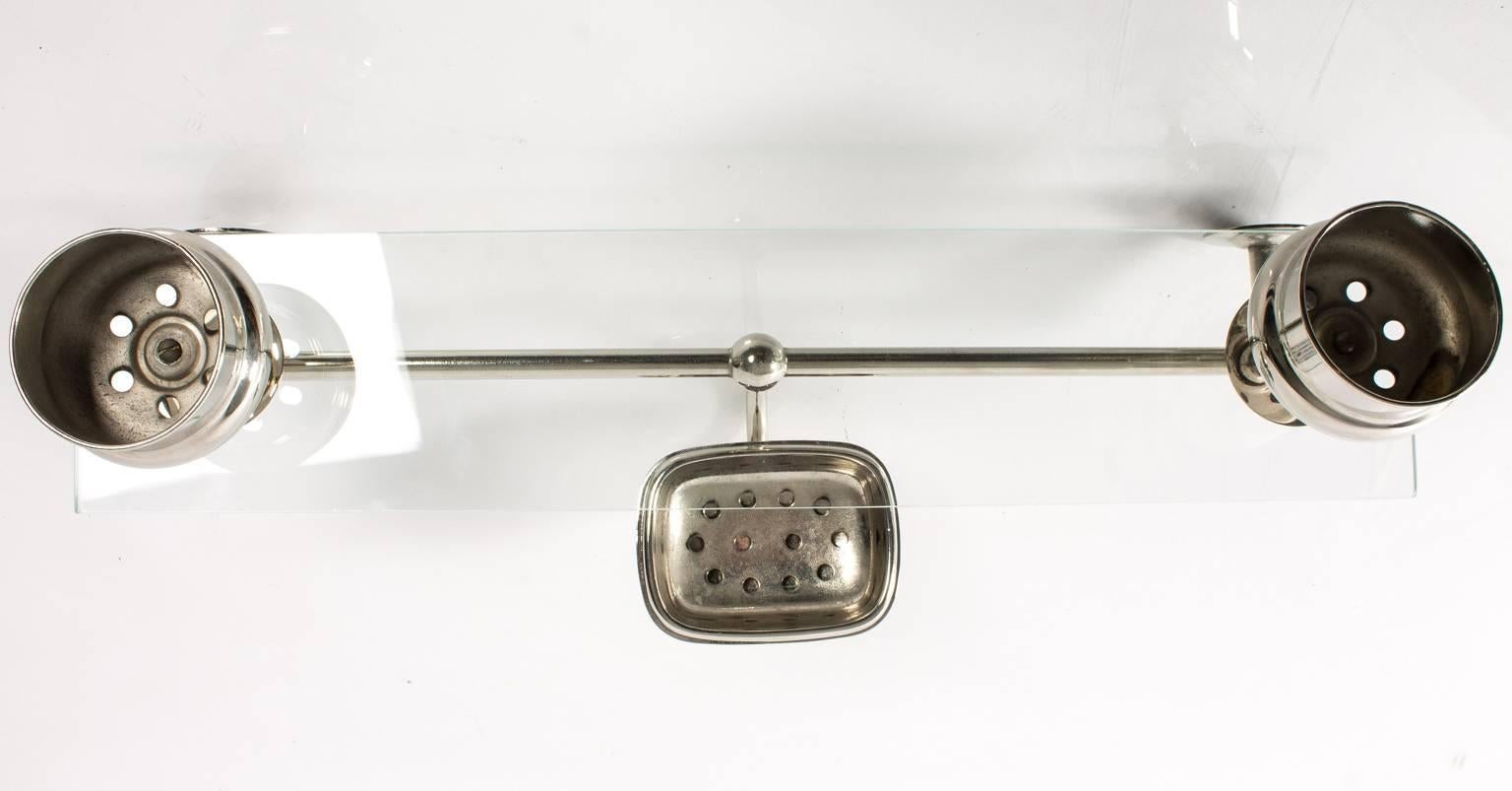 Rare combination bath shelf with soap dish and tooth brush holder attachments.