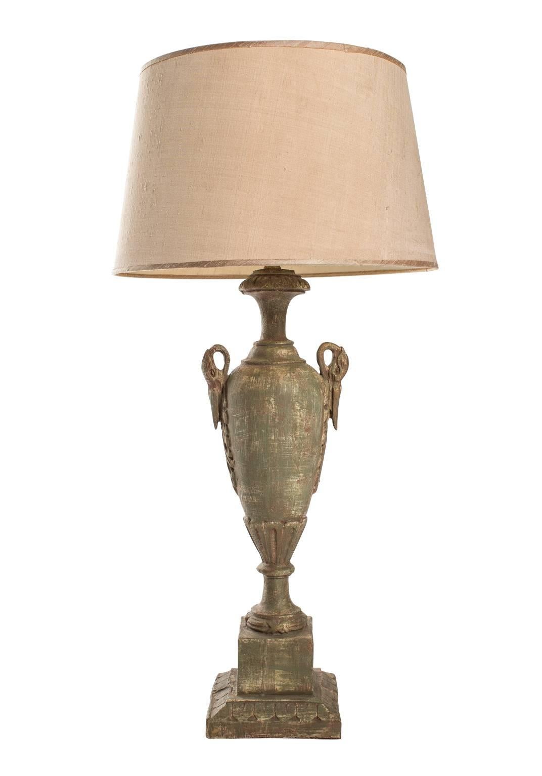 Pair of neoclassical style painted wood, urn form table lamps.