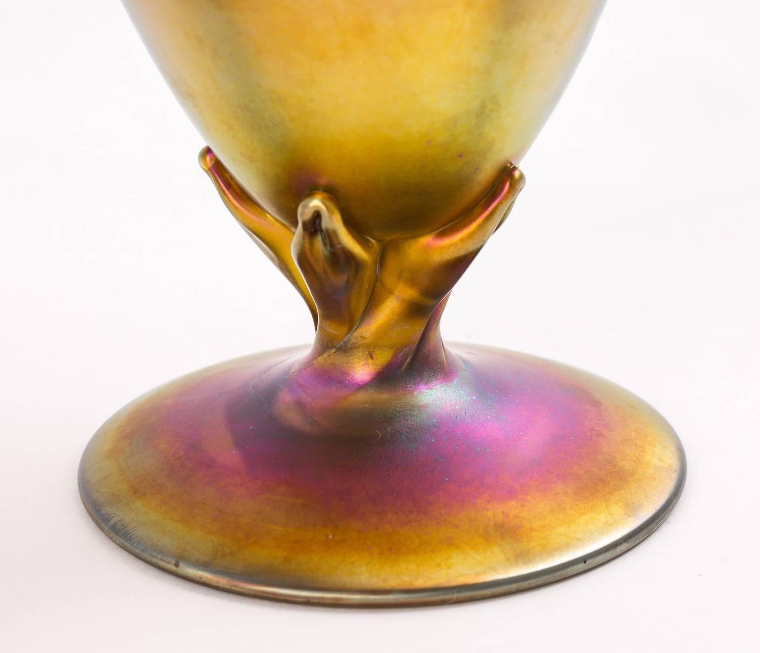 Louis comfort Tiffany favrile vase. Tiffany's iridescent first came in to production at the end of the 19th century. Signed.
