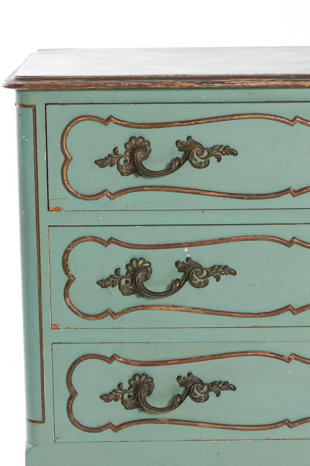 Louis XV style commode, painted in a blue green. Three drawers with bronze hardware.