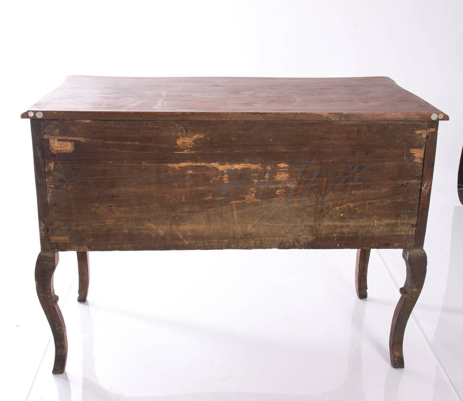 18th century walnut Italian commode, fashioned in the Louis XV style.