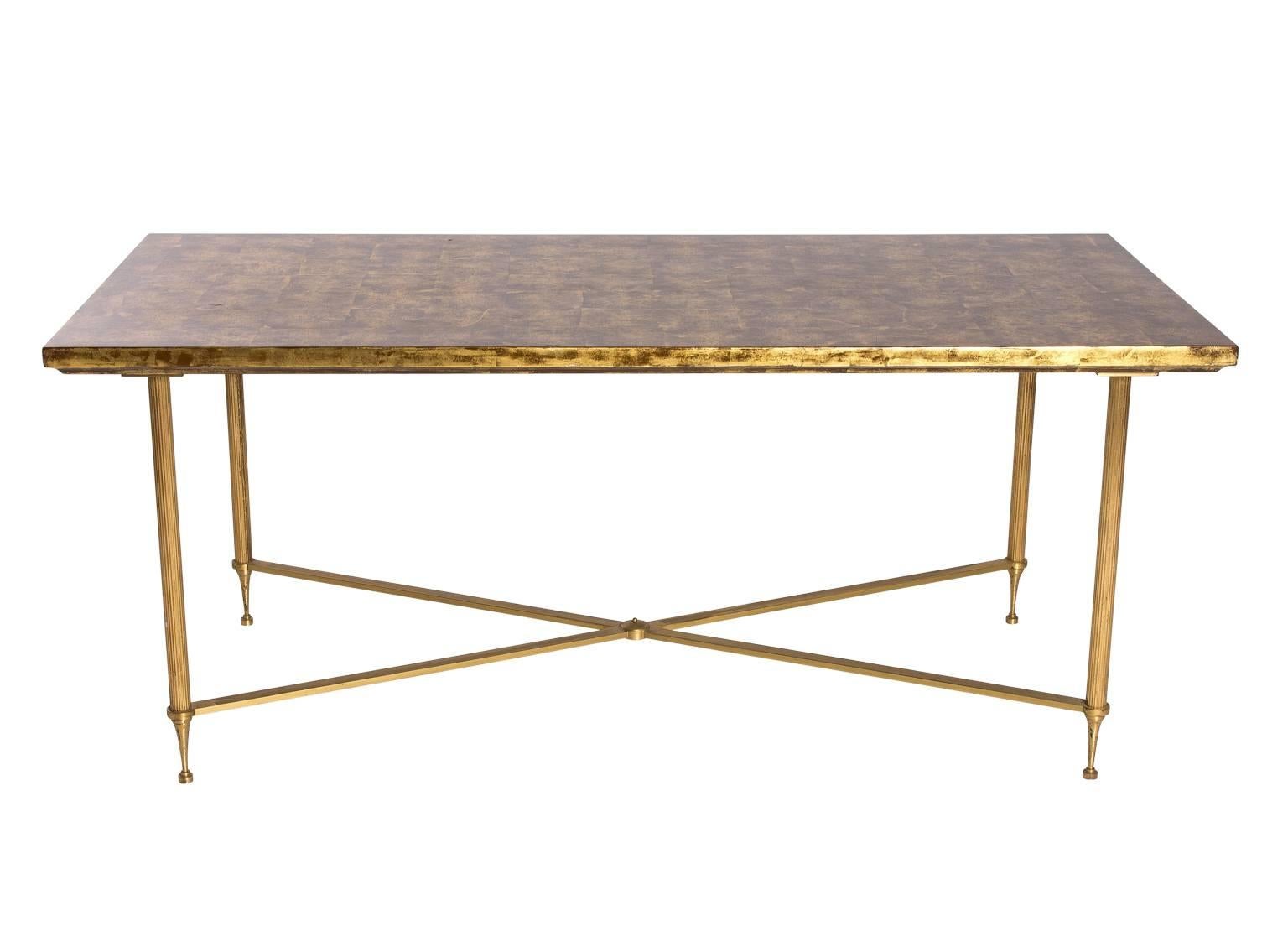 Gold leaf verre églomisé coffee table.
       