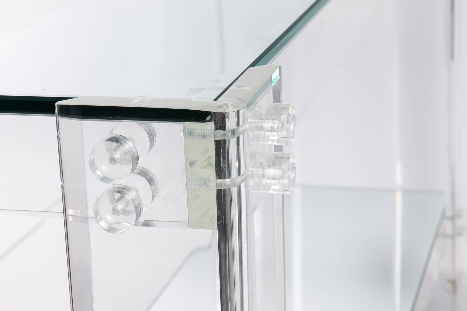 Tiered Lucite console table.
  