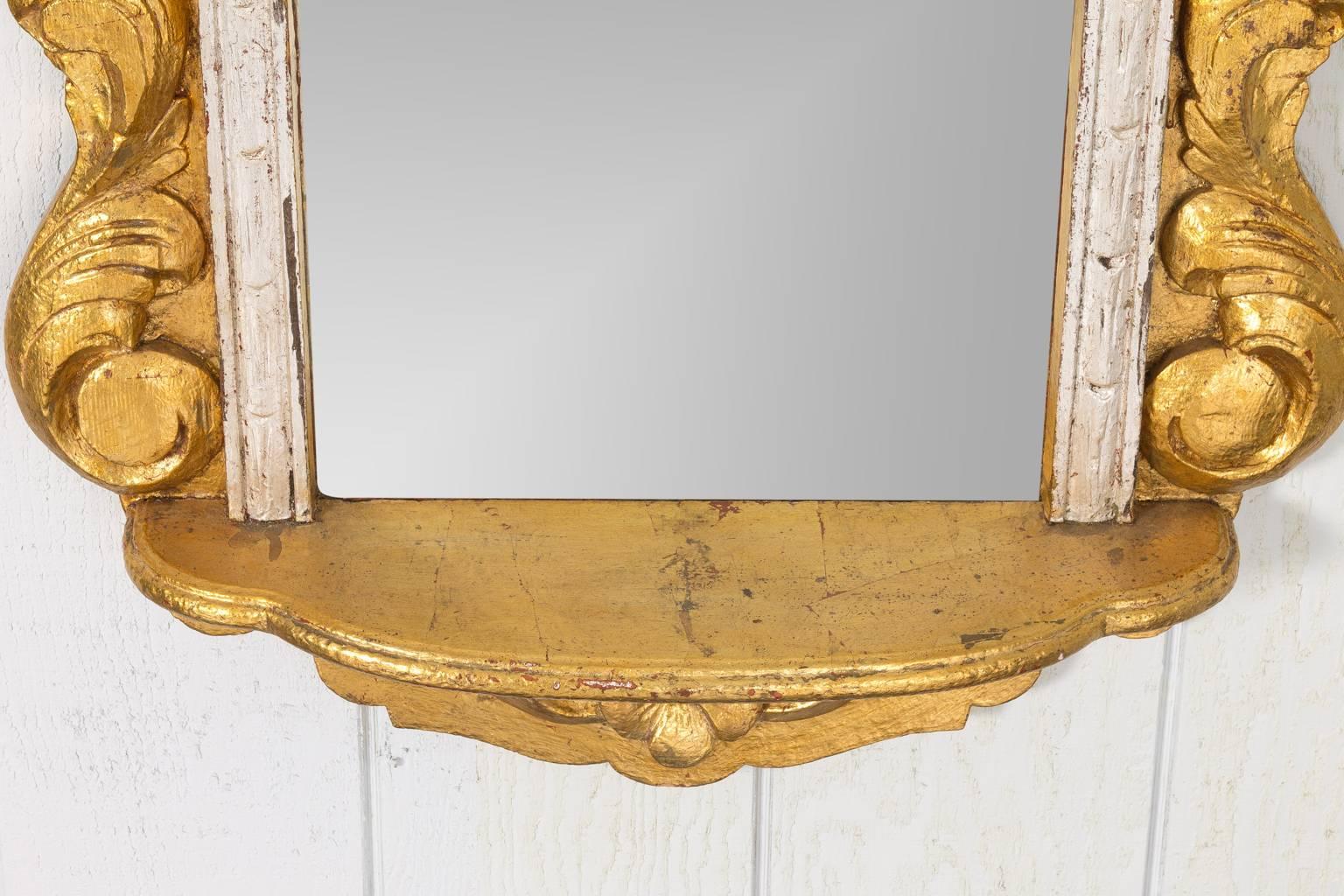 Baroque Style Carved Gilded Wall Mirror In Good Condition In Stamford, CT