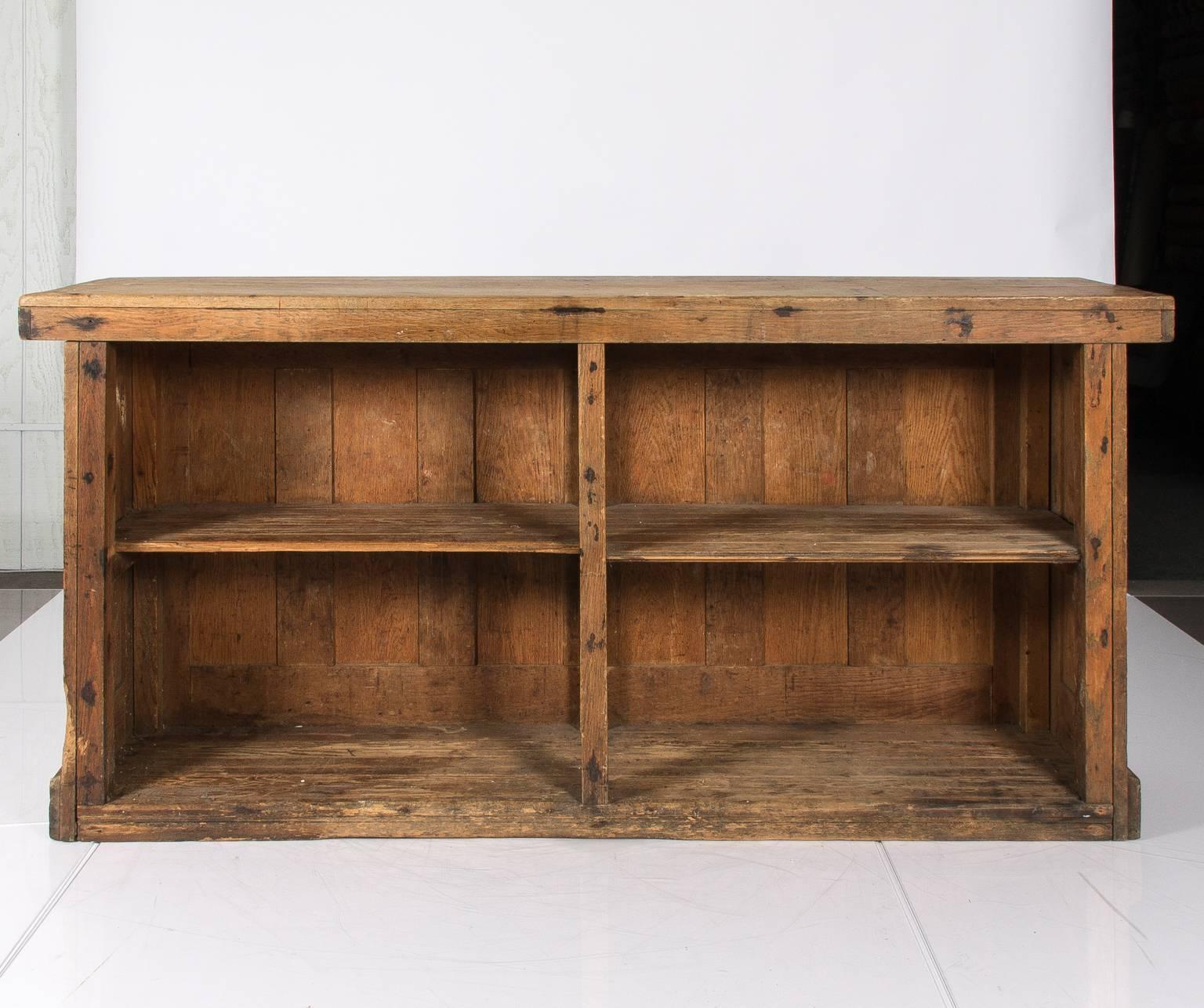 1880s chestnut store counter with bread board interior shelves.
 