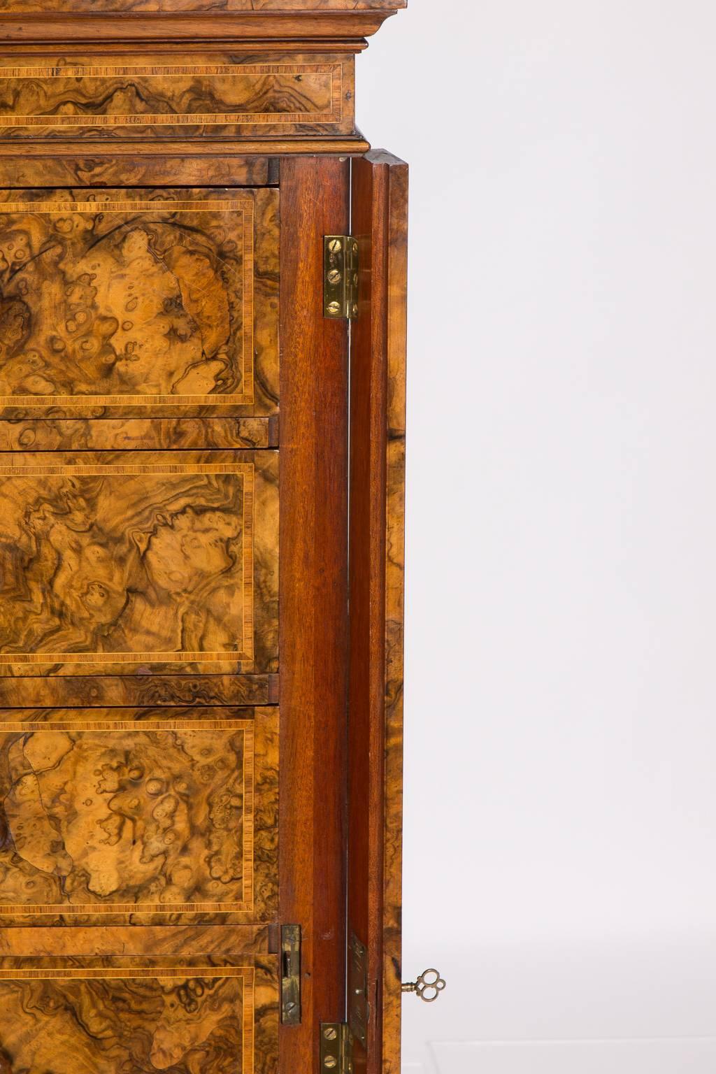 19th century seven-drawer burl wood chest.
       