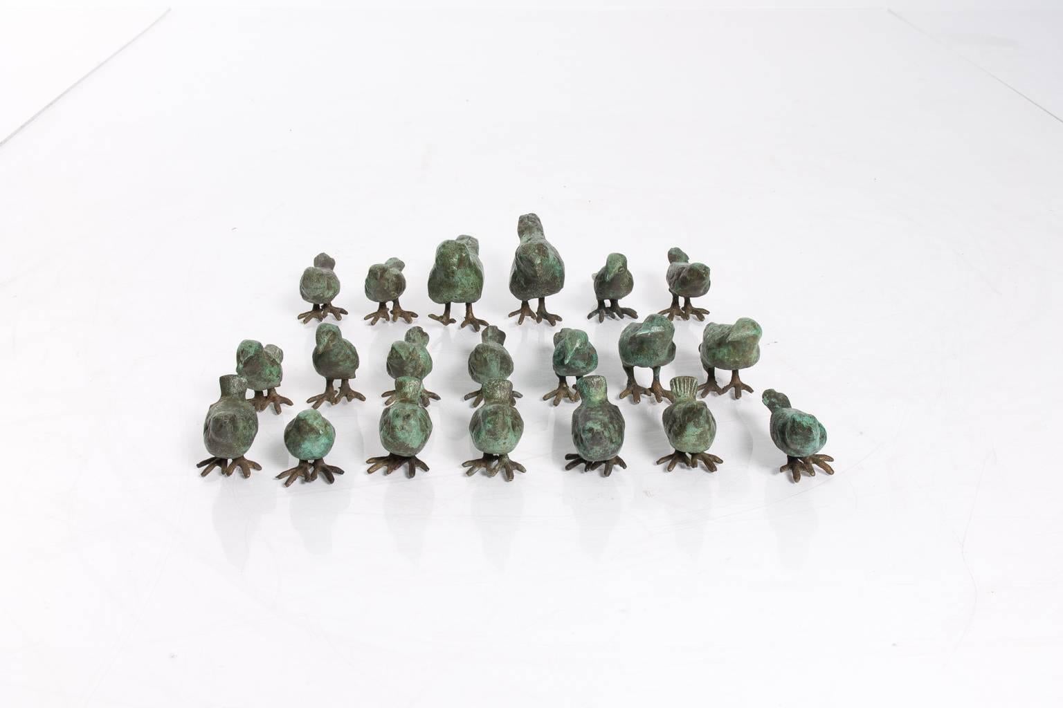 Beautifully handcrafted set of 20 patinated bronze bird sculptures.
 