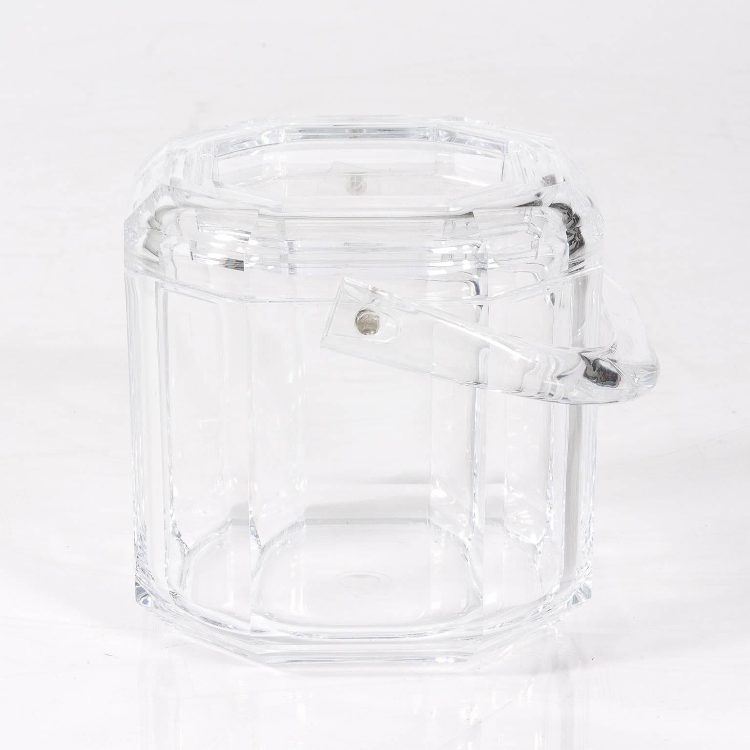 Heavy Lucite ice bucket with cover, circa 1970s.
 