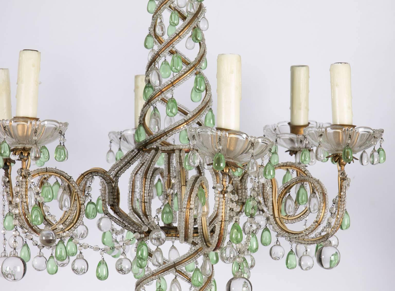 Early 20th century green and white six-light crystal chandelier.
   