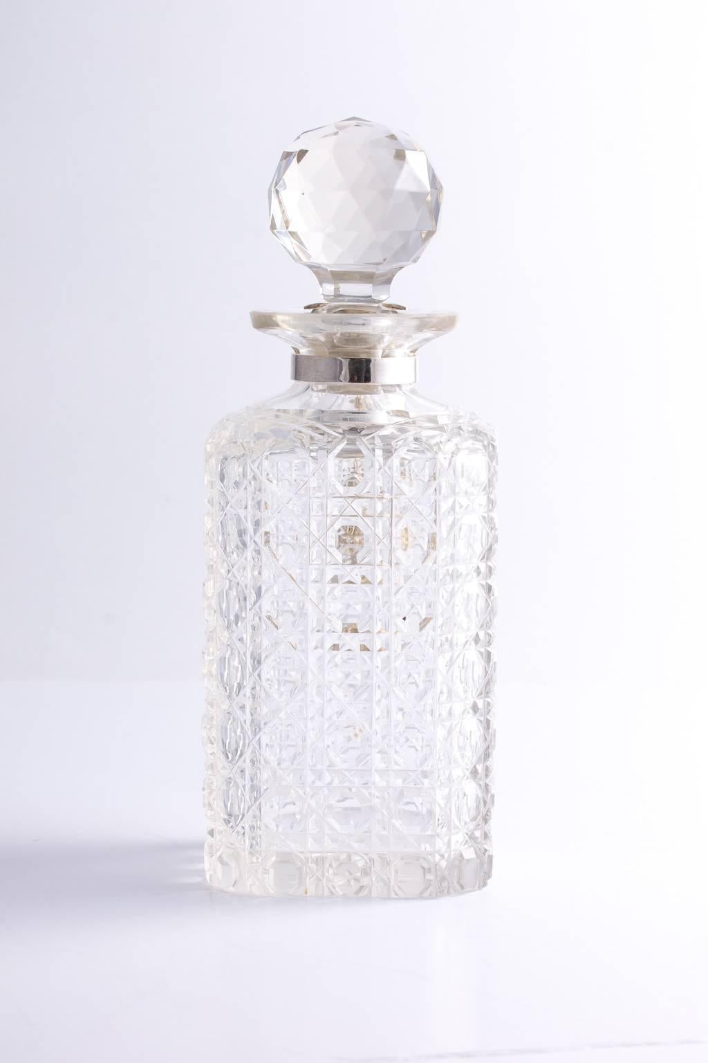George Betjemann & Sons Patent Englsih cut crystal and silver decanter with lock, circa 1900s (working condition).