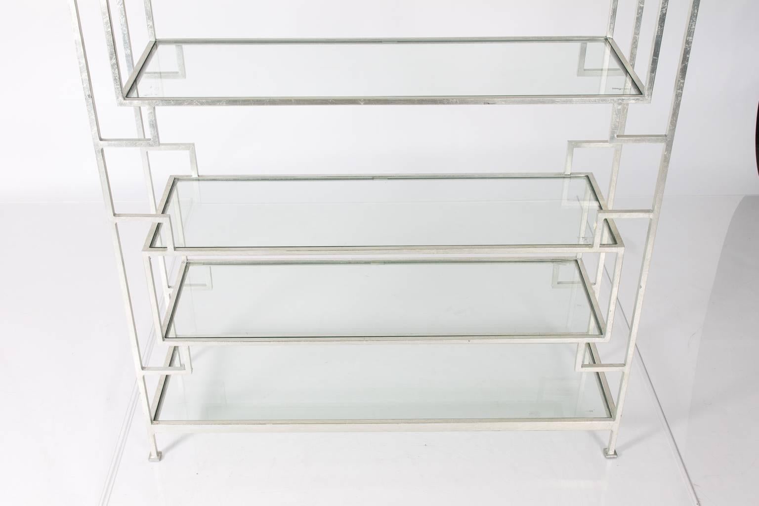 Silver leaf metal étagère with three glass shelves.
 