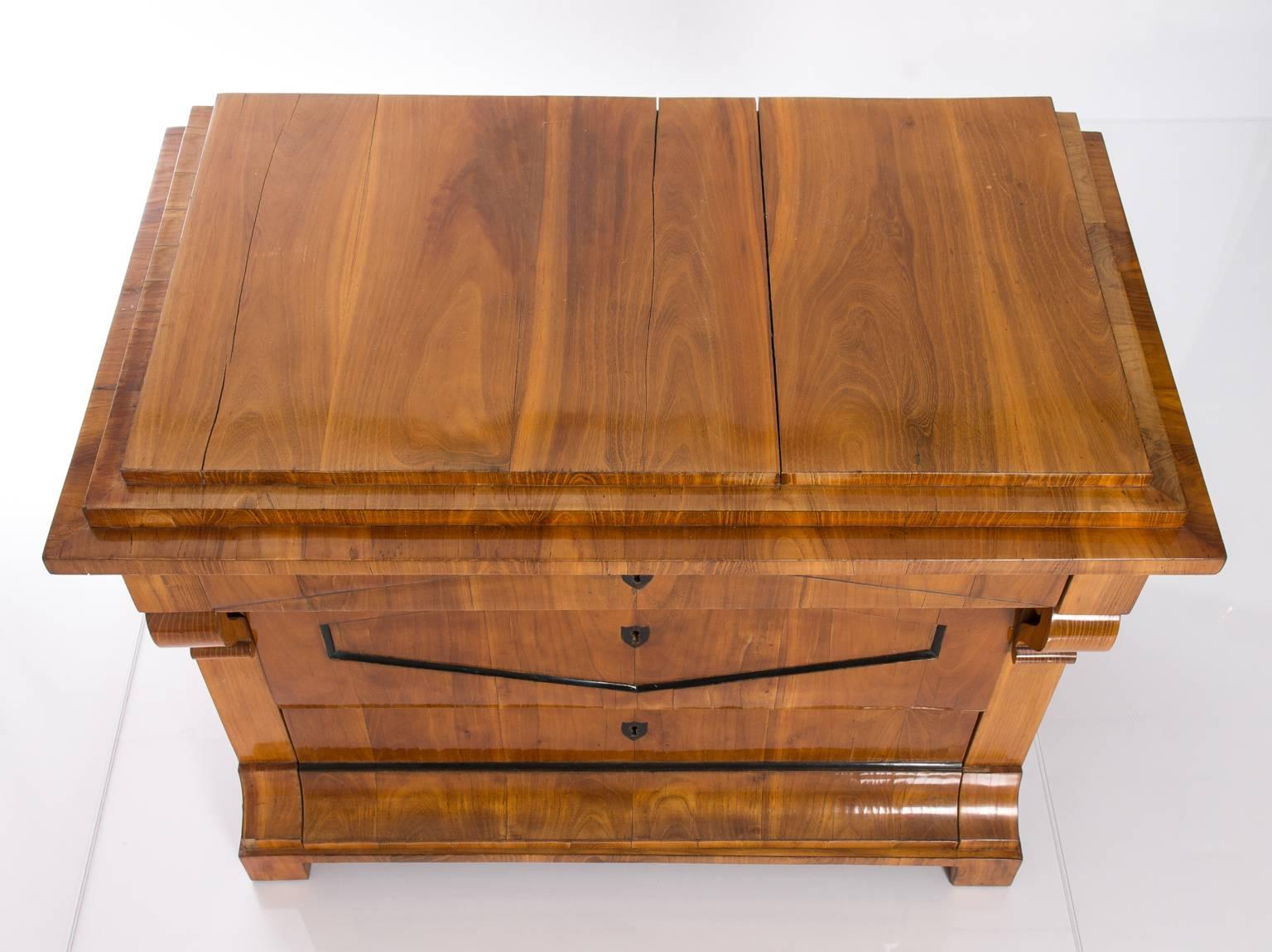 Walnut Biedermeier three-drawer chest.
 