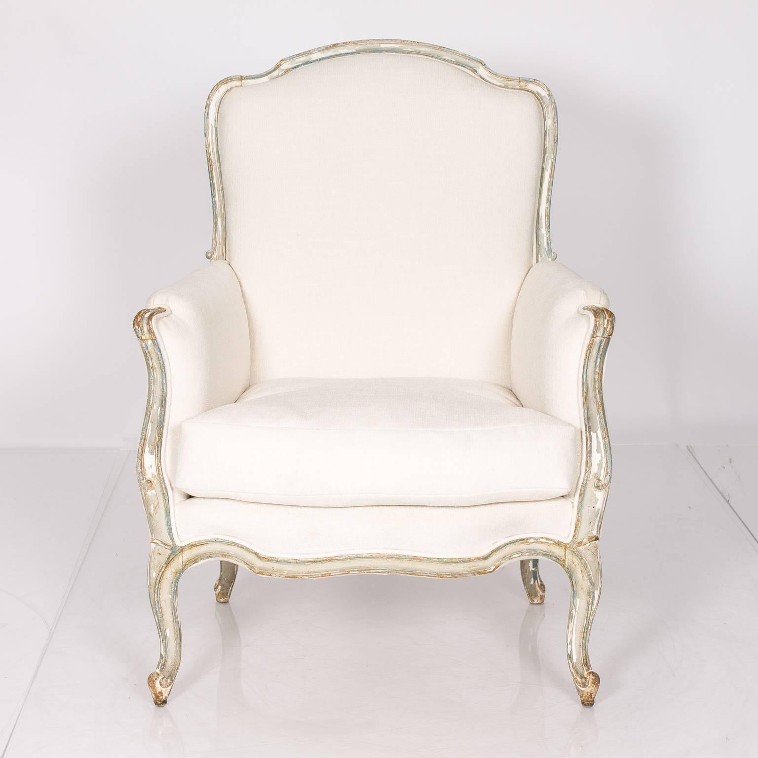 Pair of circa 1875 Italian Bergère chairs, freshly upholstered in white linen blend fabric.
      