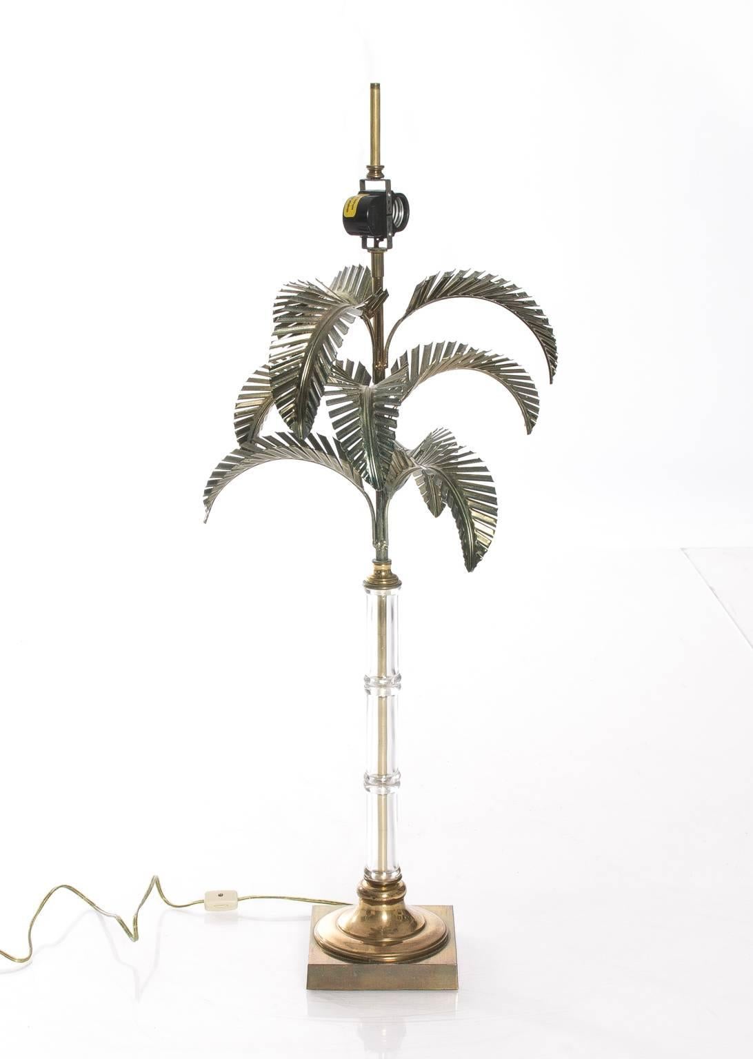 Vintage brass and glass body palm tree lamp, comes with matching shade.
  