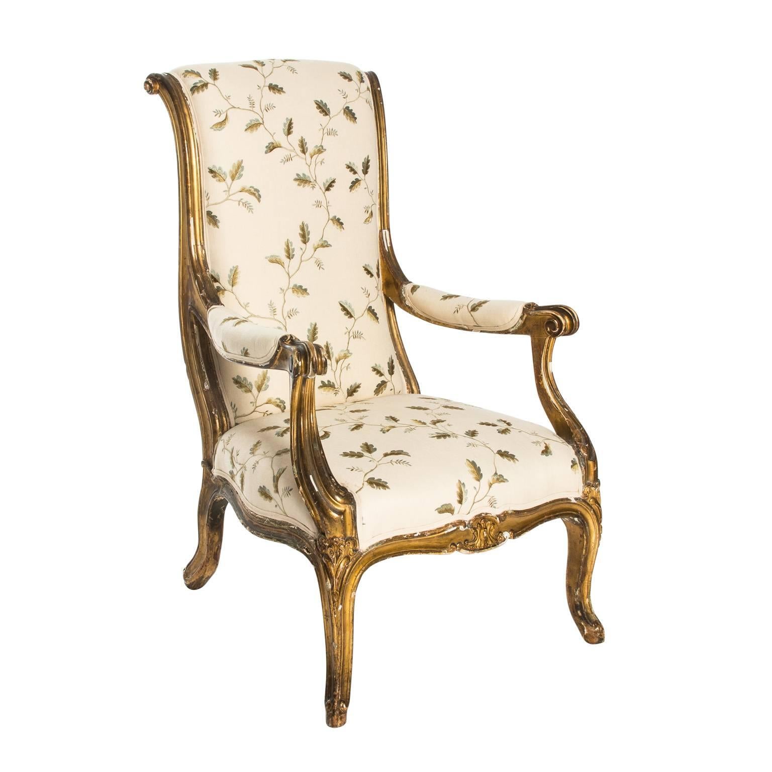 Upholstered Russian open armchair with gold gilt, circa 19th century.
 