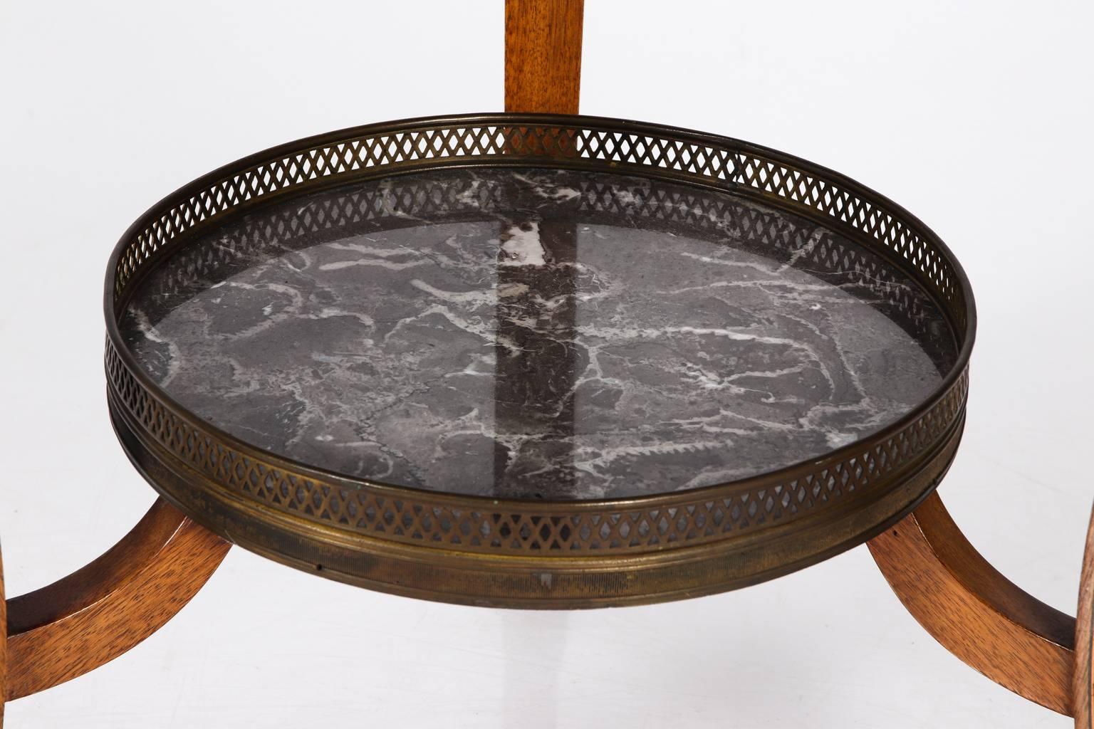 Regency style card table with a marble top, circa 19th century.
 