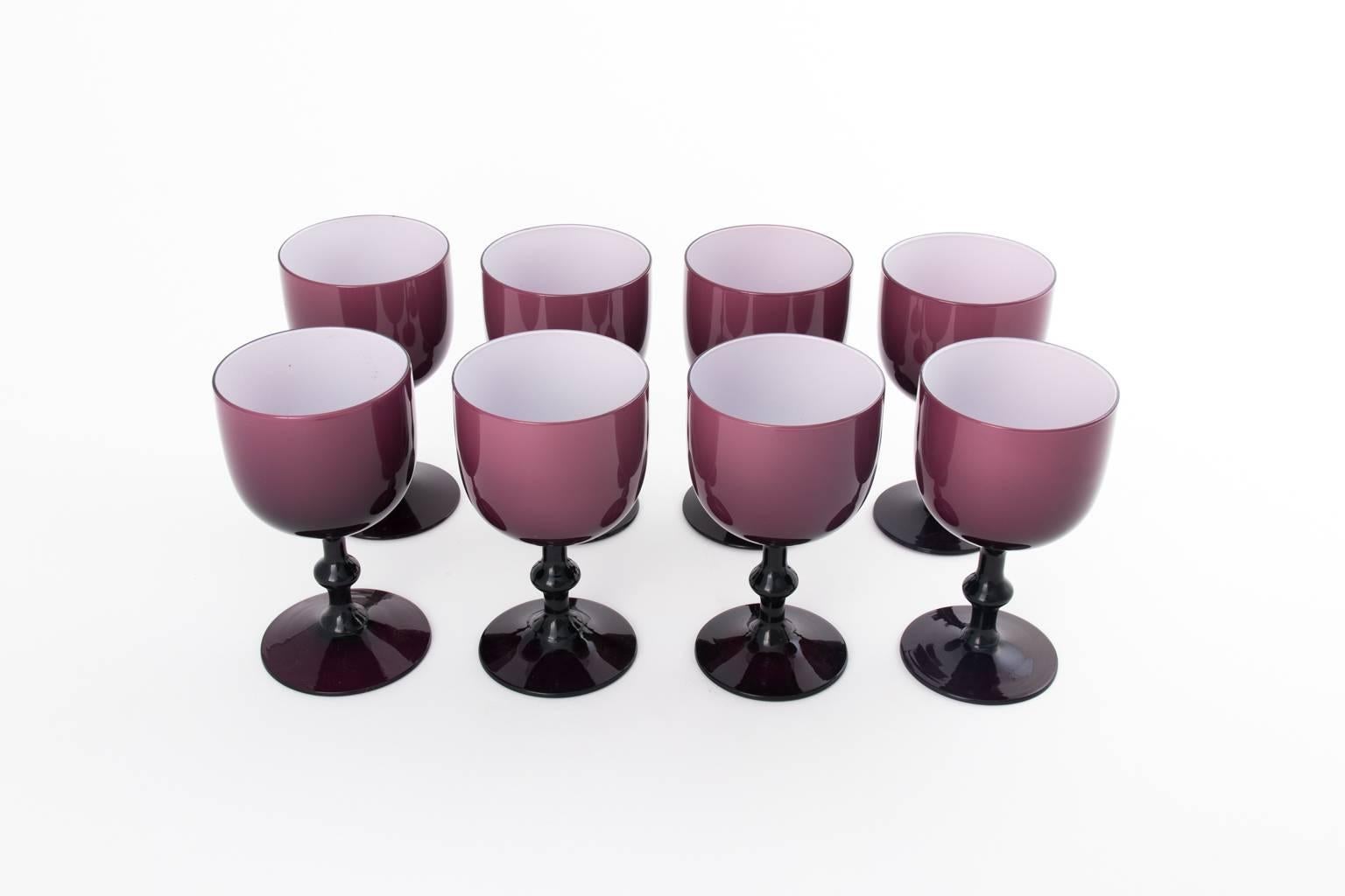 1960s set of eight Italian purple glass wine goblets with pitcher.
 