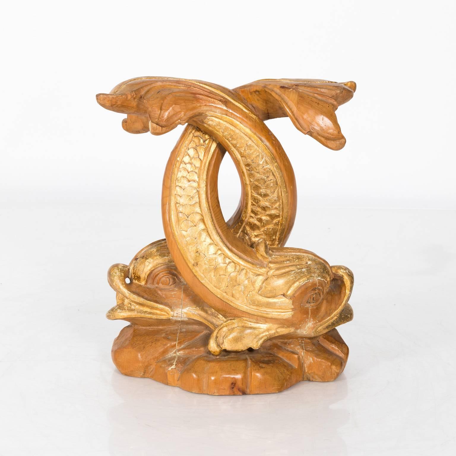 Pair of mid-20th century hand-carved and gilded wooden dolphin bases.
 