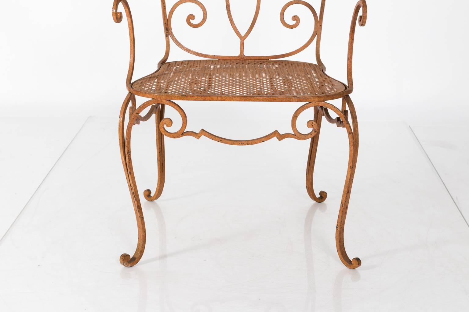 Pair of Jean Charles Moreaux garden chairs in wrought iron, circa 1940.
  