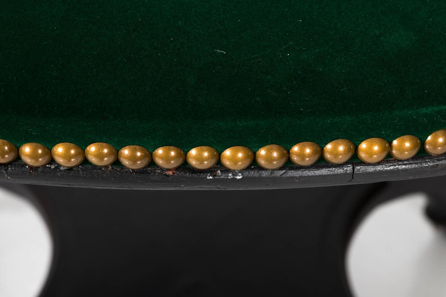 George Hunzinger game table with a circular top, circa late 19th century.
 