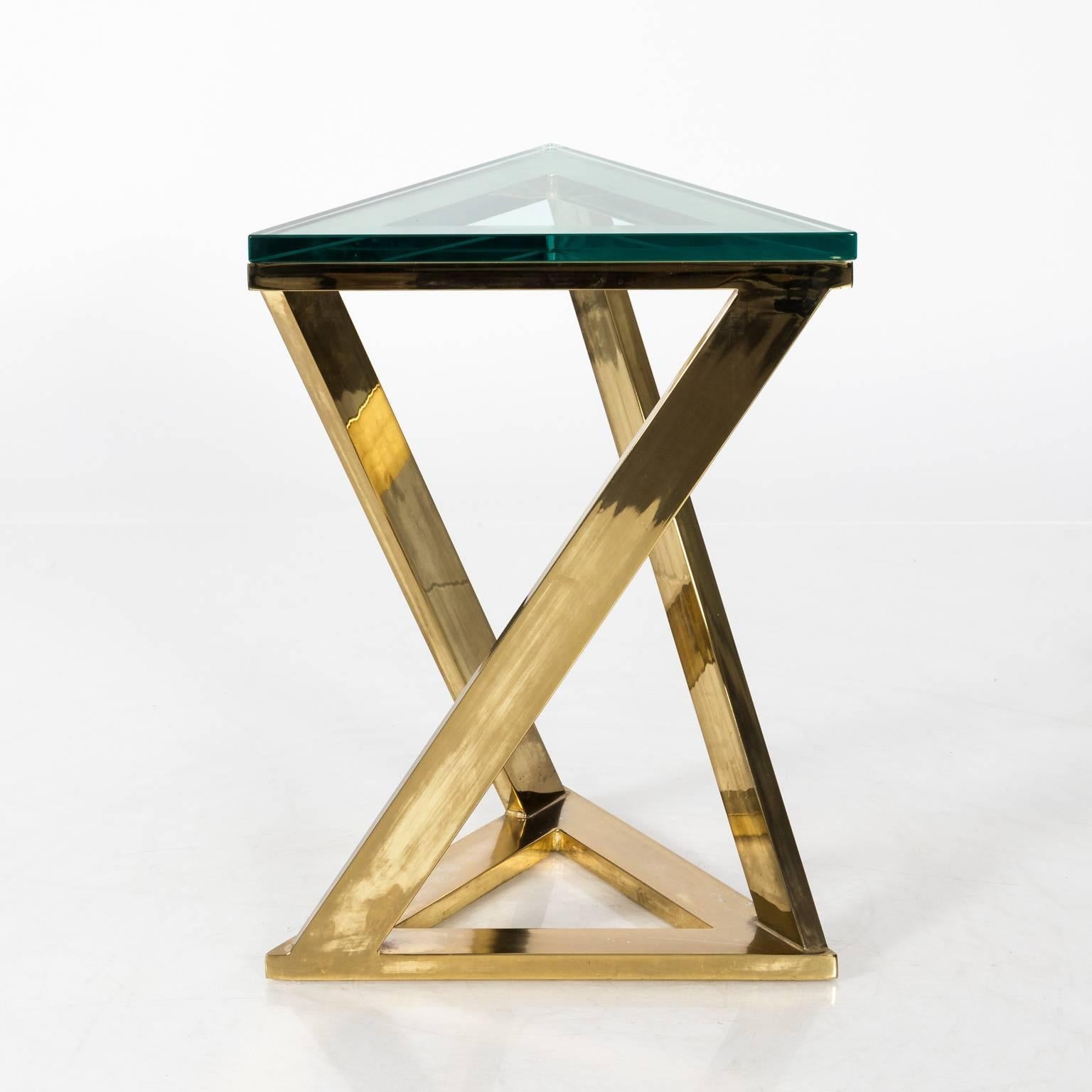 Vintage brass triangle side table, circa 1970.
 