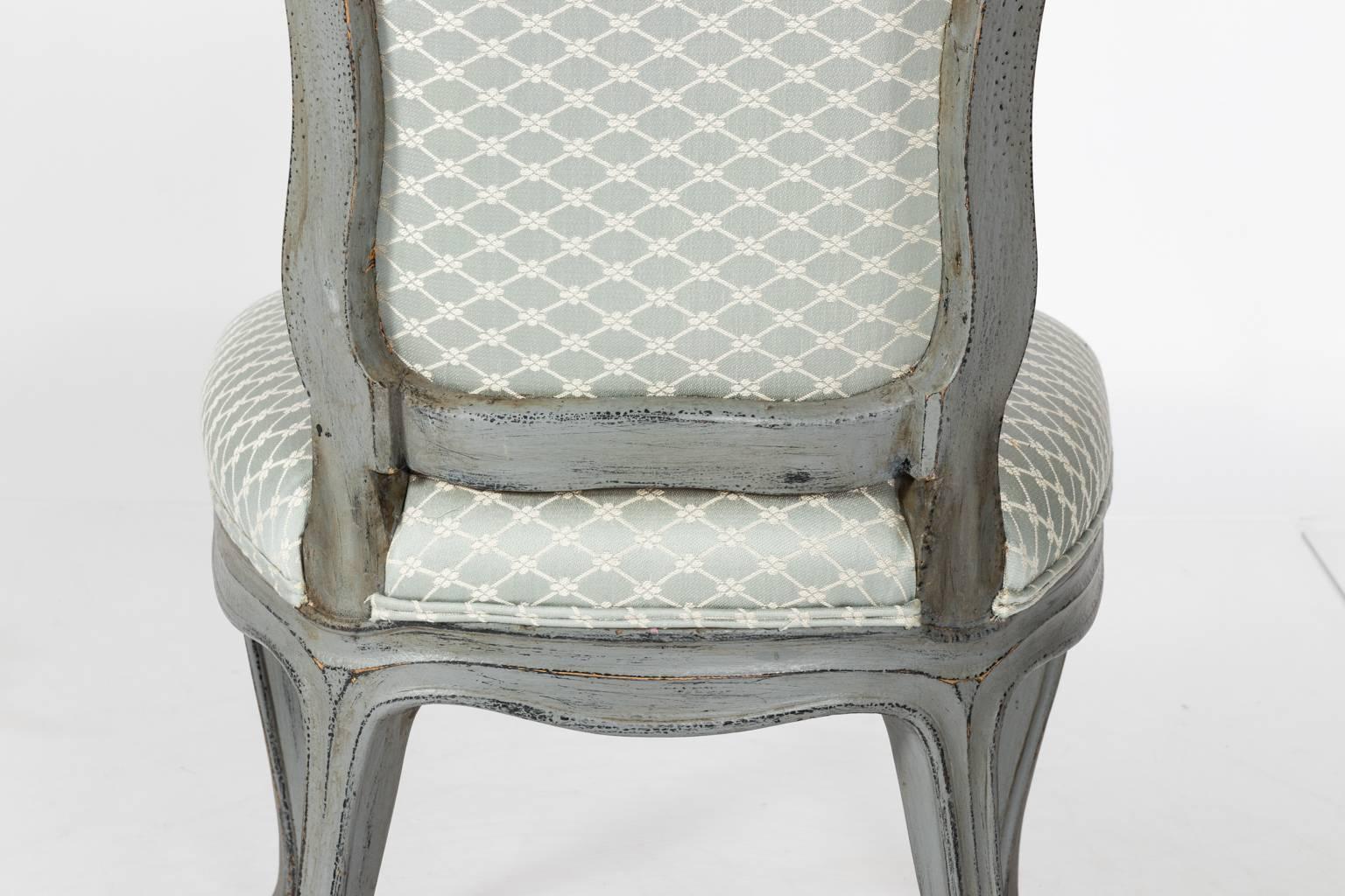 A set of six Rococo style gray-painted dining chairs, circa 1890s
 