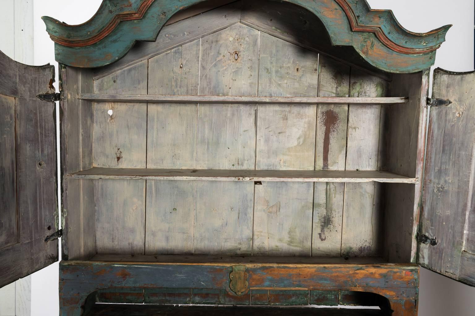 Blue painted Provincial Rococo-style cabinet.
  
