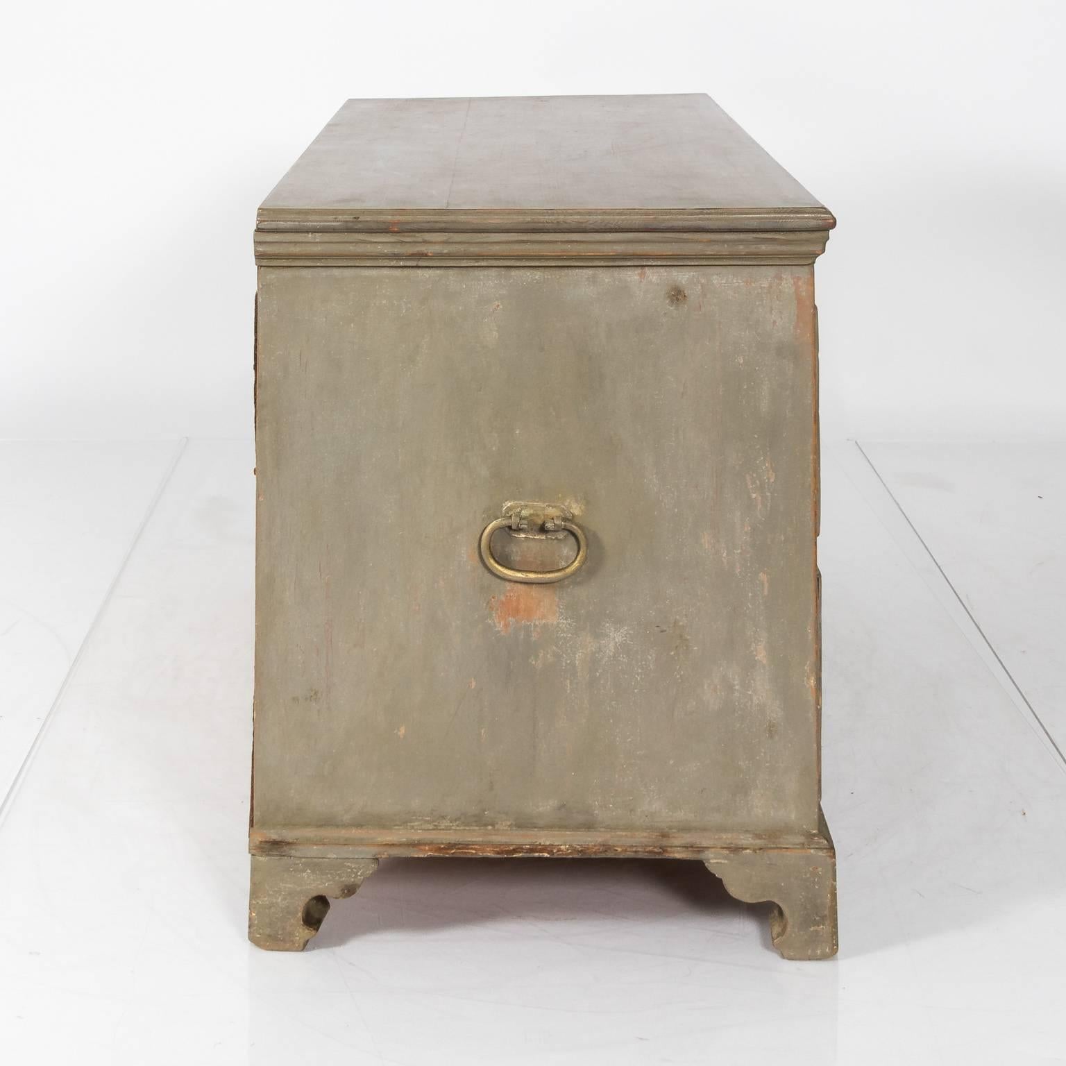 A grey-painted early 19th century Gustavian dresser with two drawers.
 