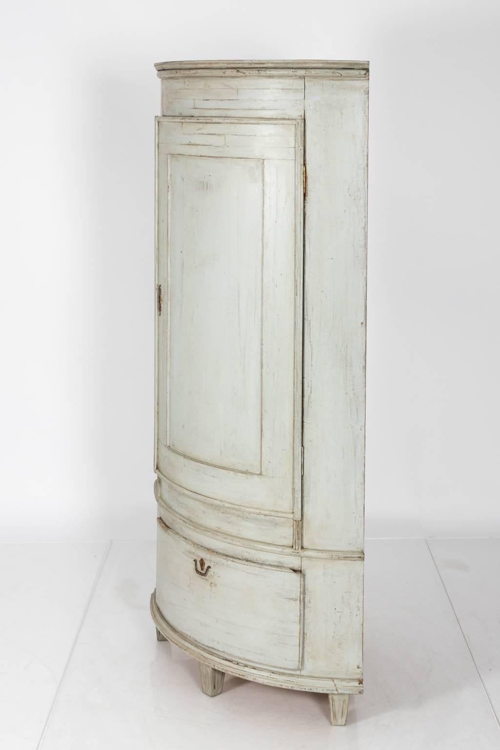 1800s grey-painted Gustavian corner cabinet.
  