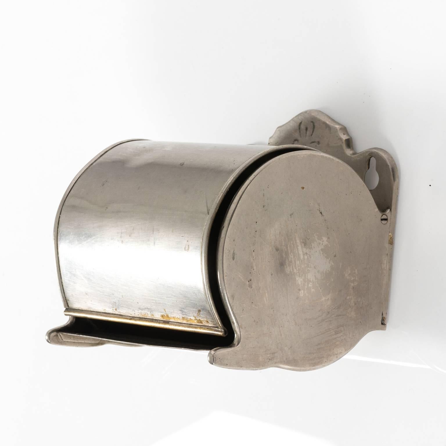 1890s covered toilet paper holder by the J.L.Mott Ironworks.
 