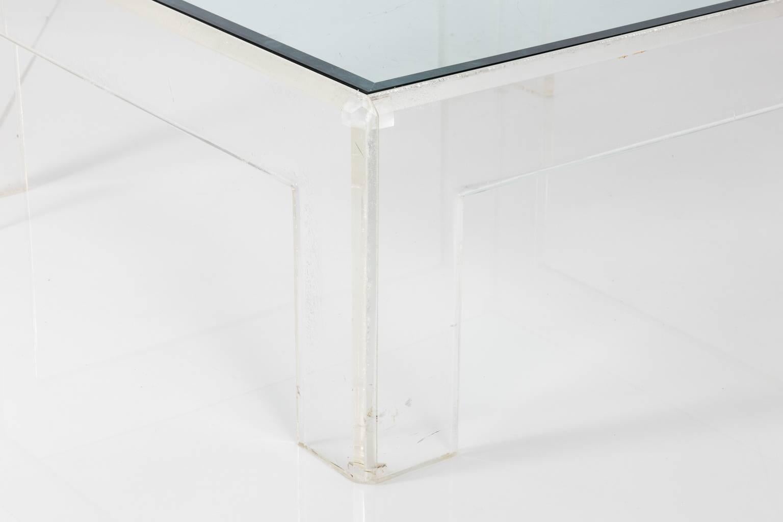 Mid-20th century Lucite base coffee table with glass top.
 