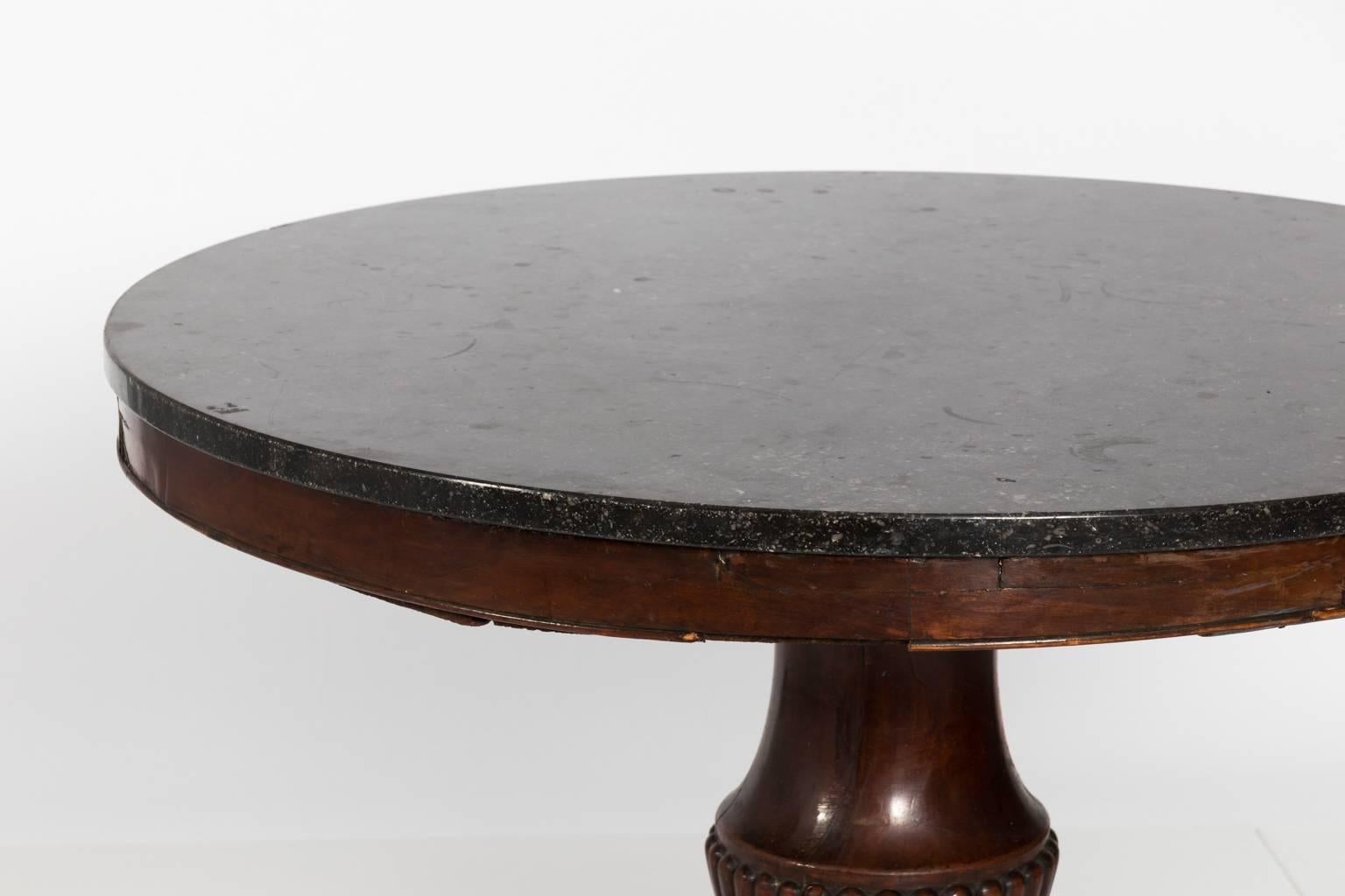 Charles X-style Mahogany center table, circa early 19th century.
 