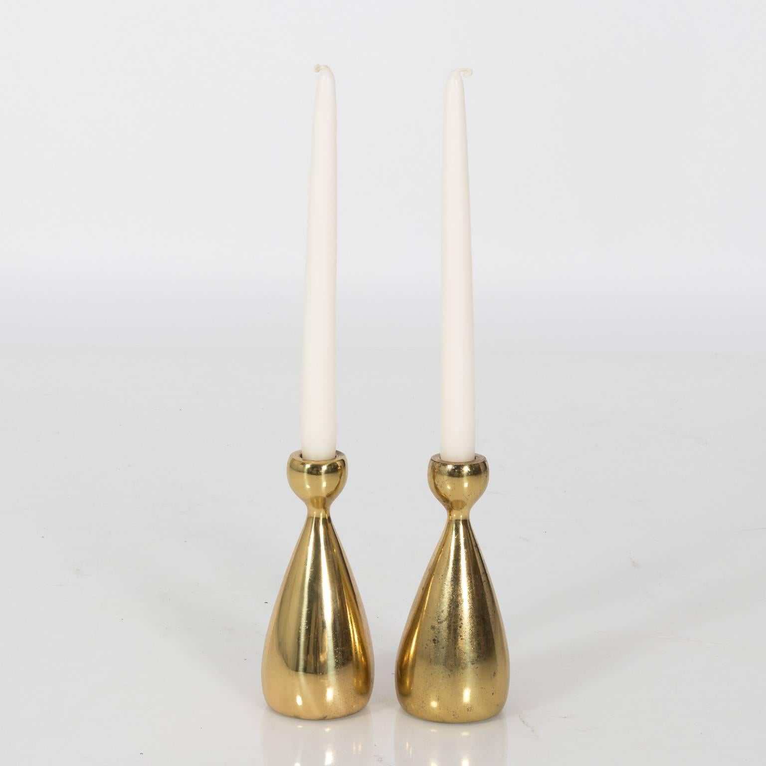 Circa 1960 pair of brass candleholders by Ben Debel.
