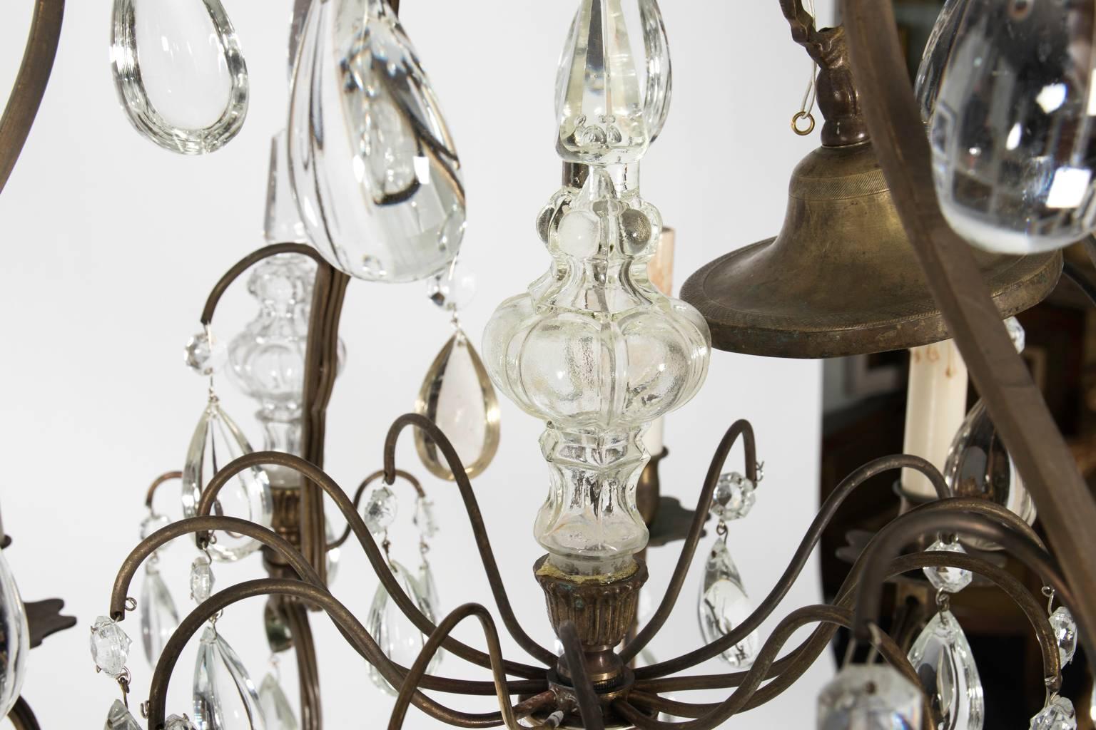 Circa 1900 crystal eight-light chandelier.
