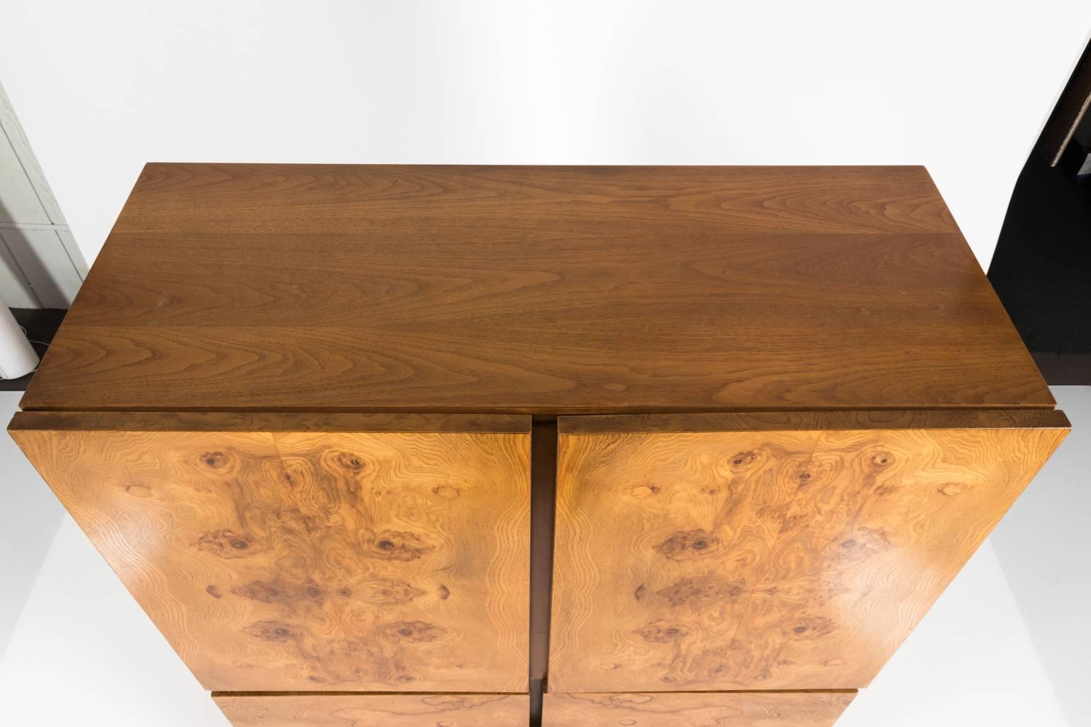 Two-door cupboard with three drawers in burl wood and walnut. Designed for Lane by Milo Baughman, circa 1970.
 