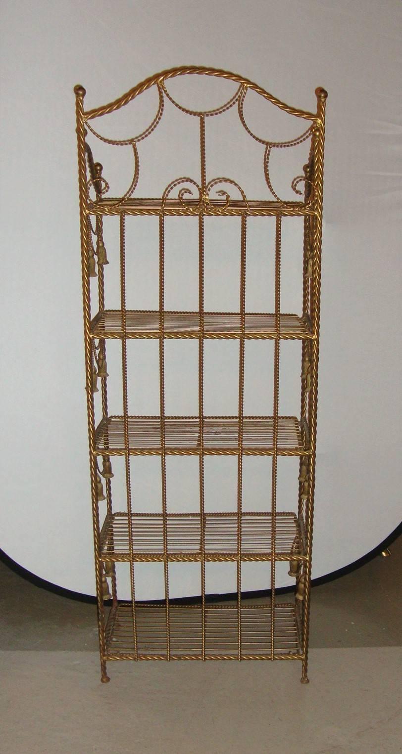 Hollywood Regency Style Brass Tastle Form Five Shelf Etagere In Good Condition In Stamford, CT