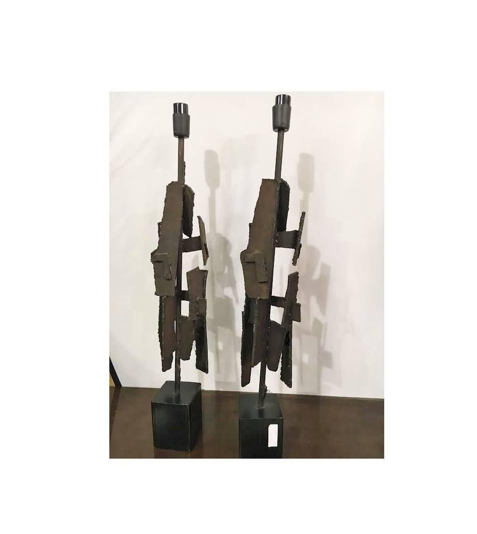 A very fine pair of Brutalist lamps possibly by the Laurel Lamp Company. Each of these lamps made from welded metal in the fashion of Brutalist design. This is an original sculpture by Richard Barr for Laurel titled “Assemblage” This piece first