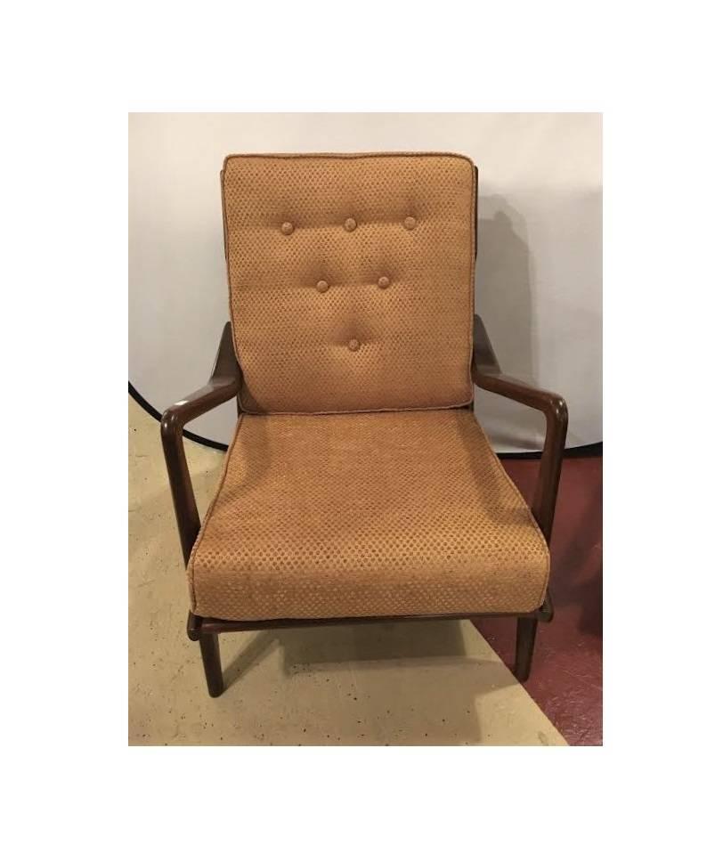 Pair of Mid-Century Modern Danish arm lounge chairs. These chairs are in excellent condition and have brand new fabric and cushions each tufted. The Z form swaying arms are sleek and very stylish. There are four chairs available only one pair are
