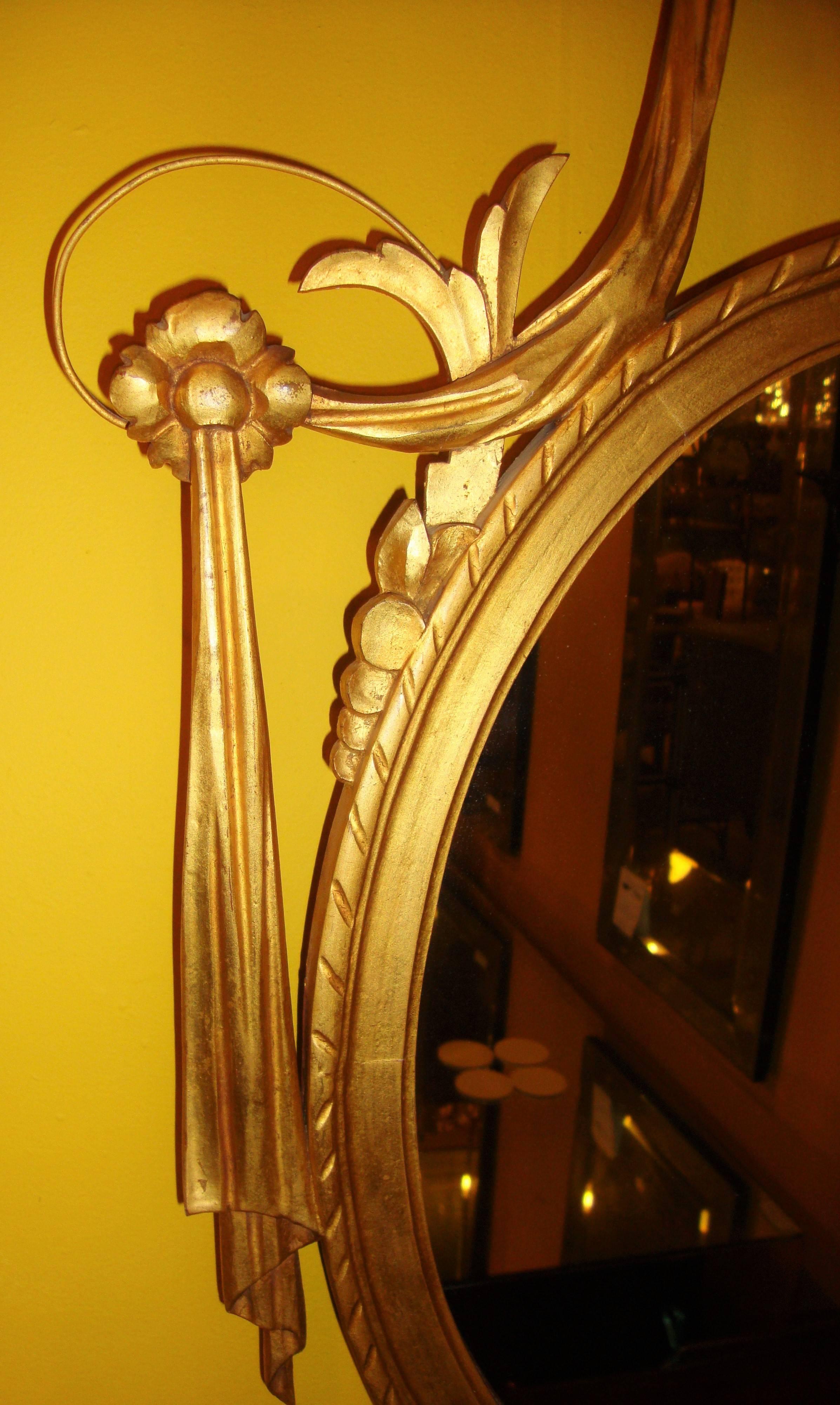 Pair of Adams Style Gilt Gold Oval Wood and Gesso Wall / Console Mirrors In Good Condition In Stamford, CT
