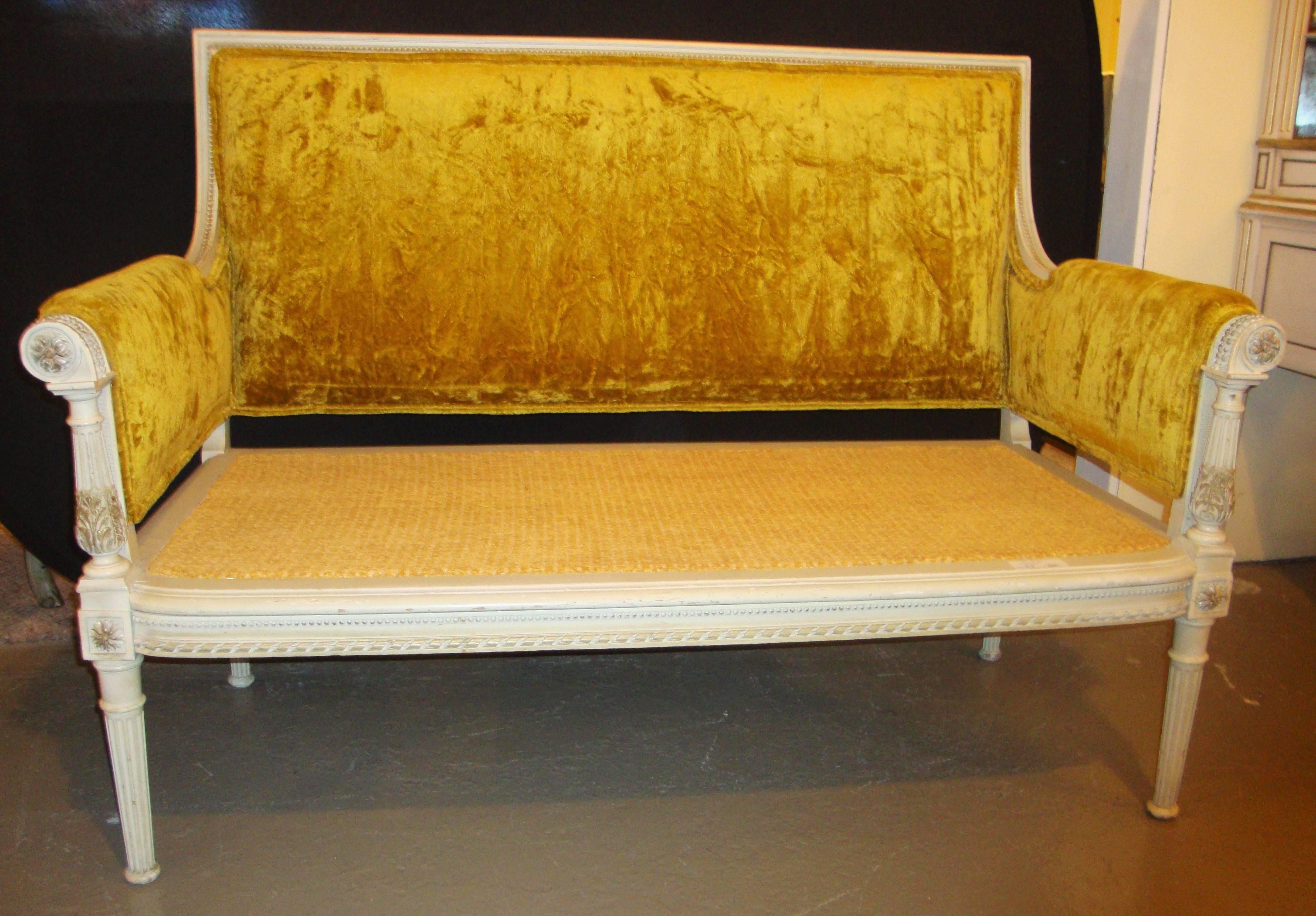 An antique Maison Jansen style settee, in a rare yellow color. This settee comes with a removable seat cushion, as well as a mesh back rest.
Seat height – 18 inches.